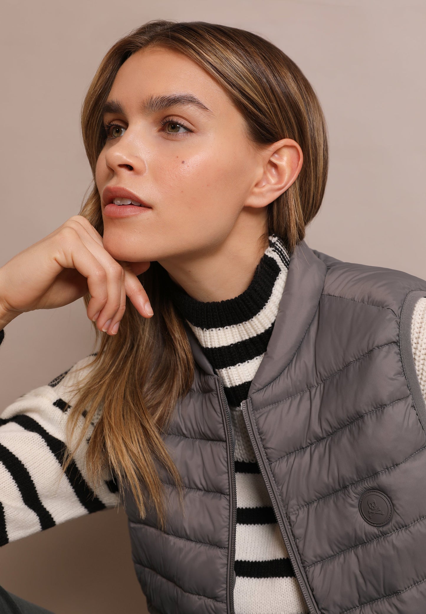 QUILTED GILET WITH SKULL DETAIL