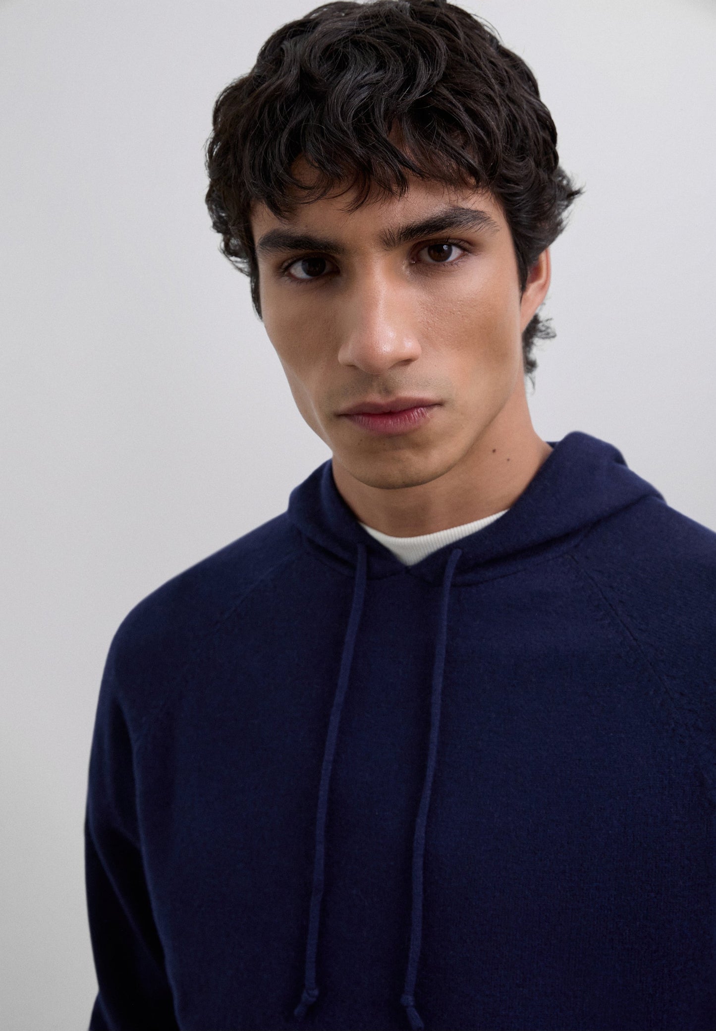 WOOL SWEATER WITH ADJUSTABLE HOOD
