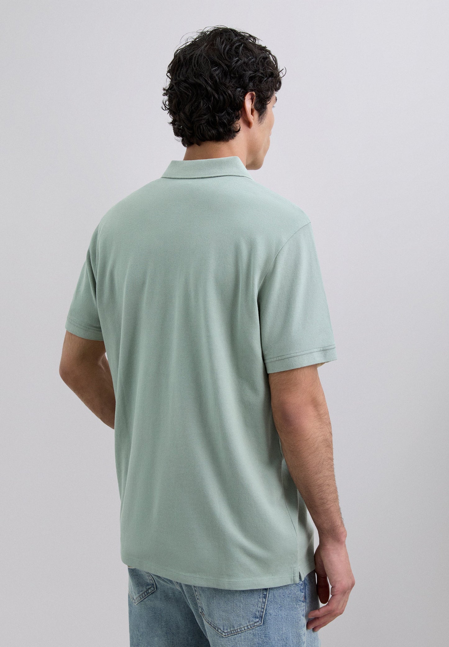 PIQUÉ POLO MET BORDUURSEL