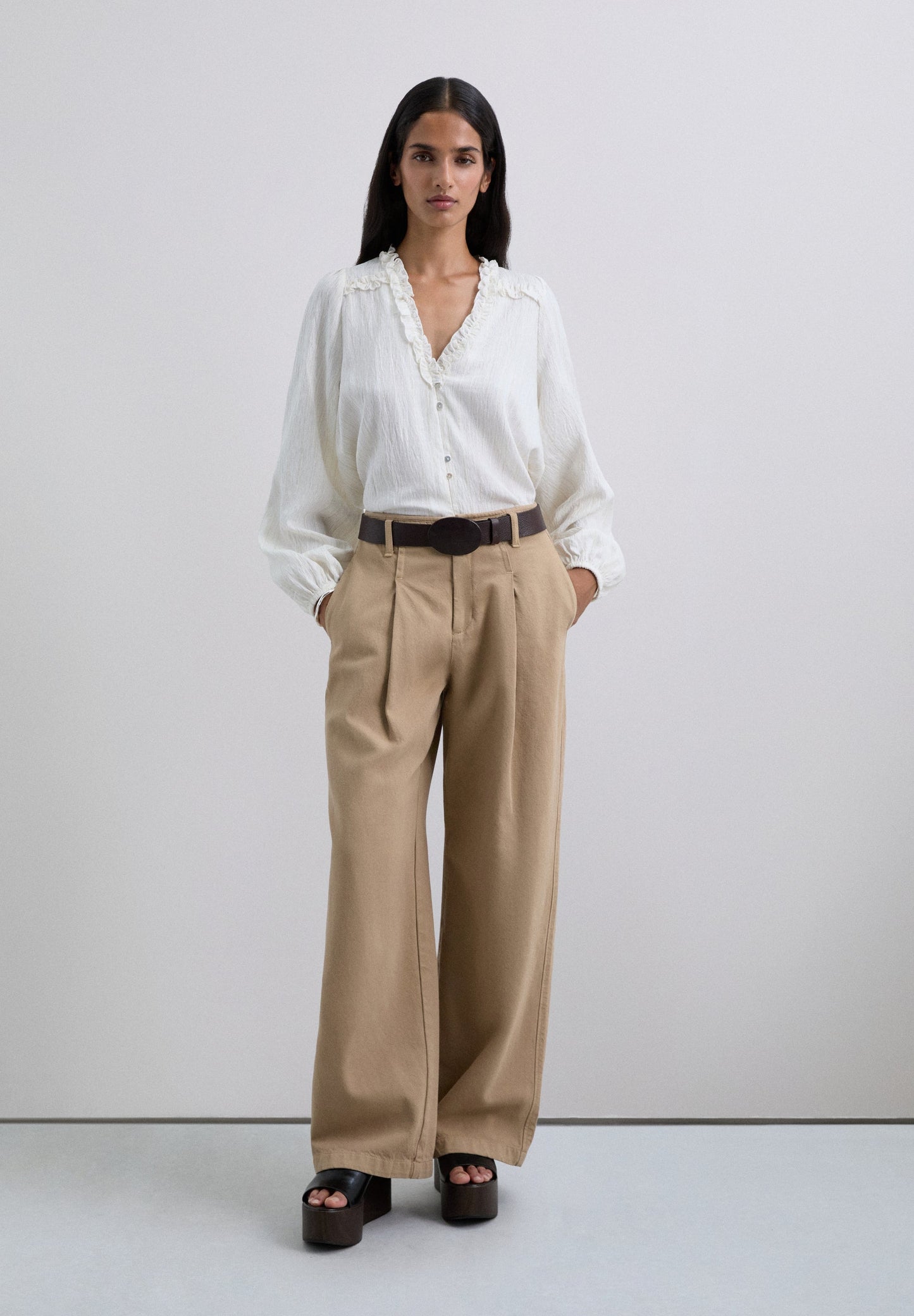 BLOUSE MET RUCHES VAN METAALDRAAD