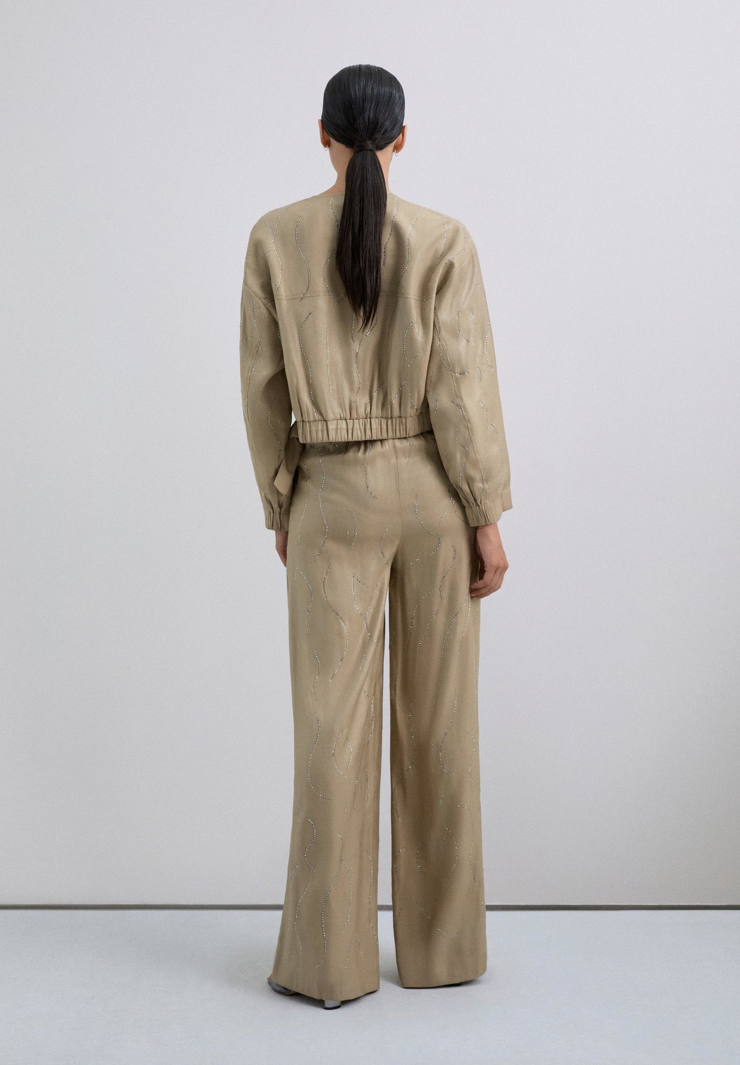 FLOWING TROUSERS WITH RHINESTONES