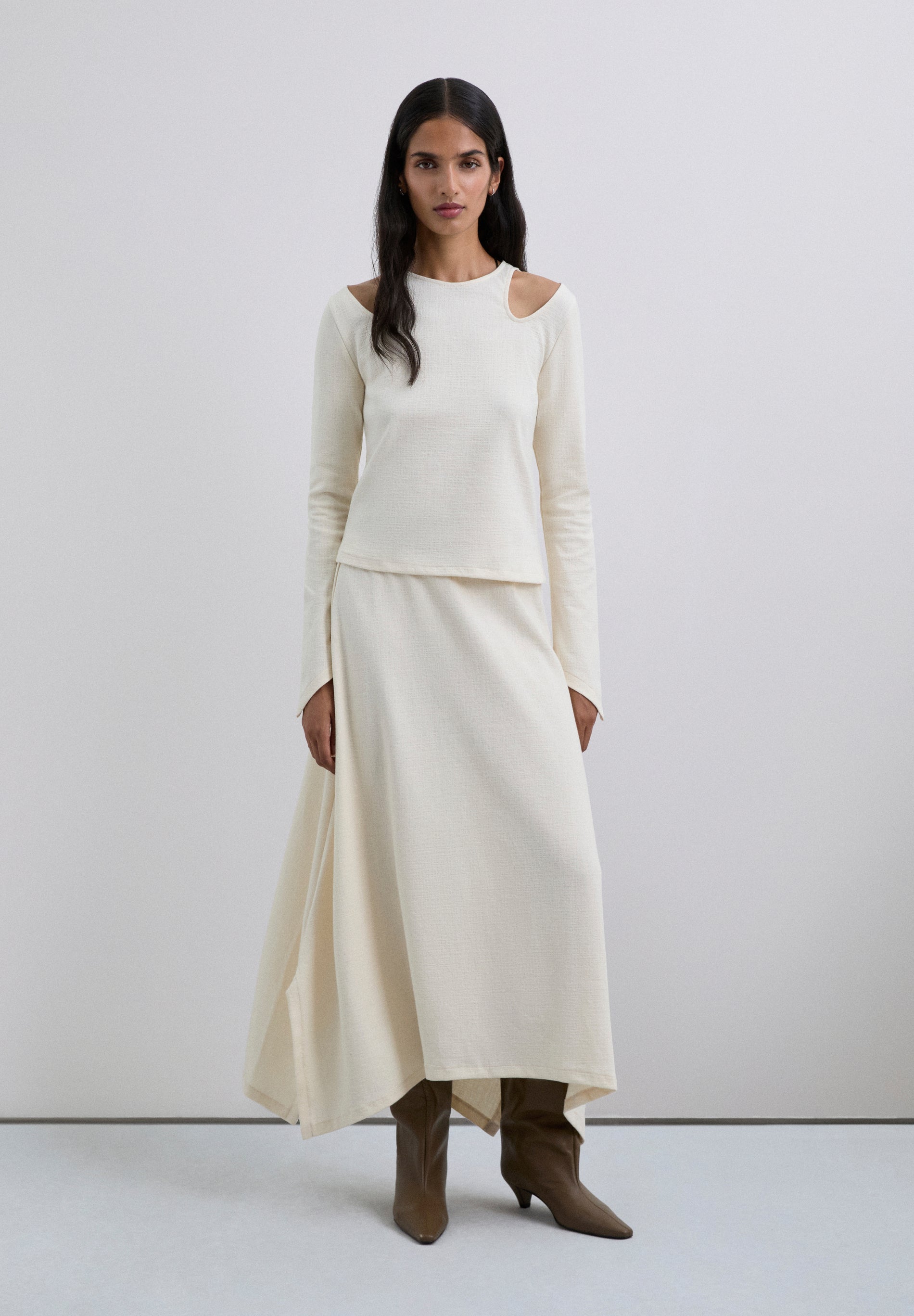 HALFLANGE ROK TRICOT ASYMMETRISCH