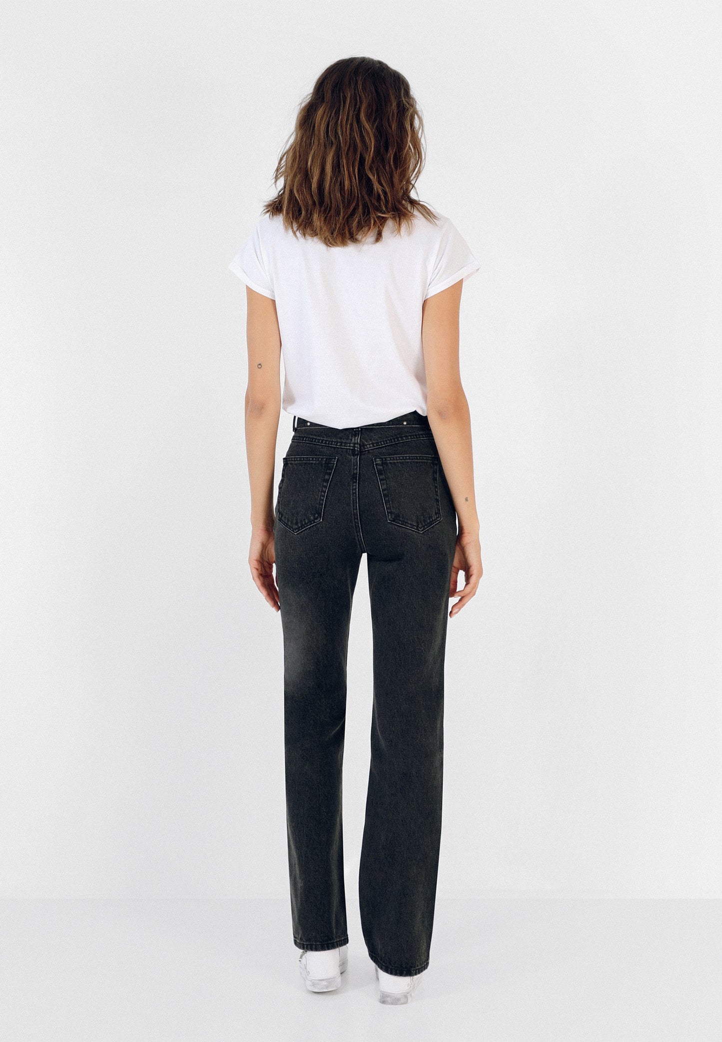 JEANS WITH BOW AND STUDS