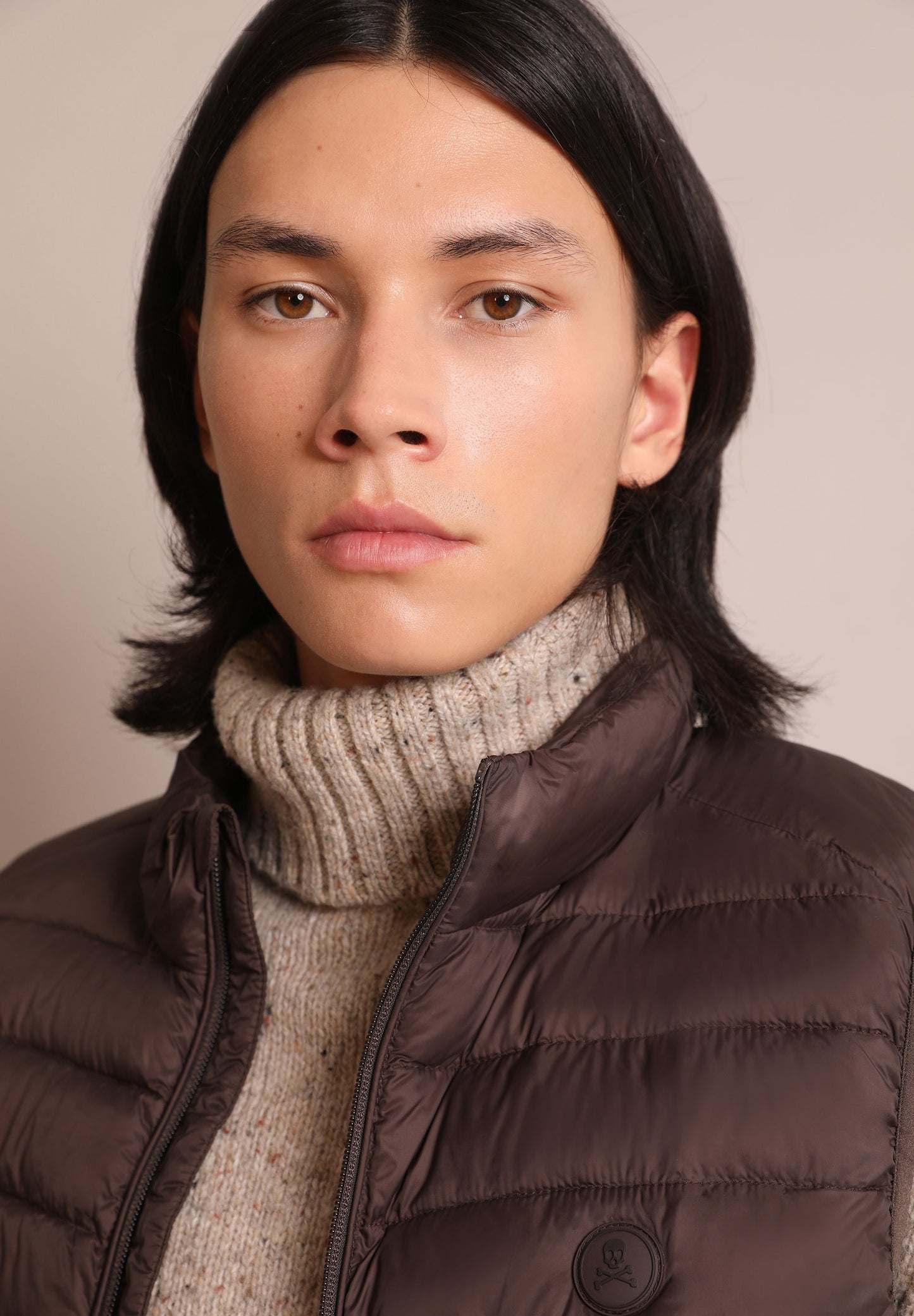 QUILTED GILET WITH SKULL DETAIL