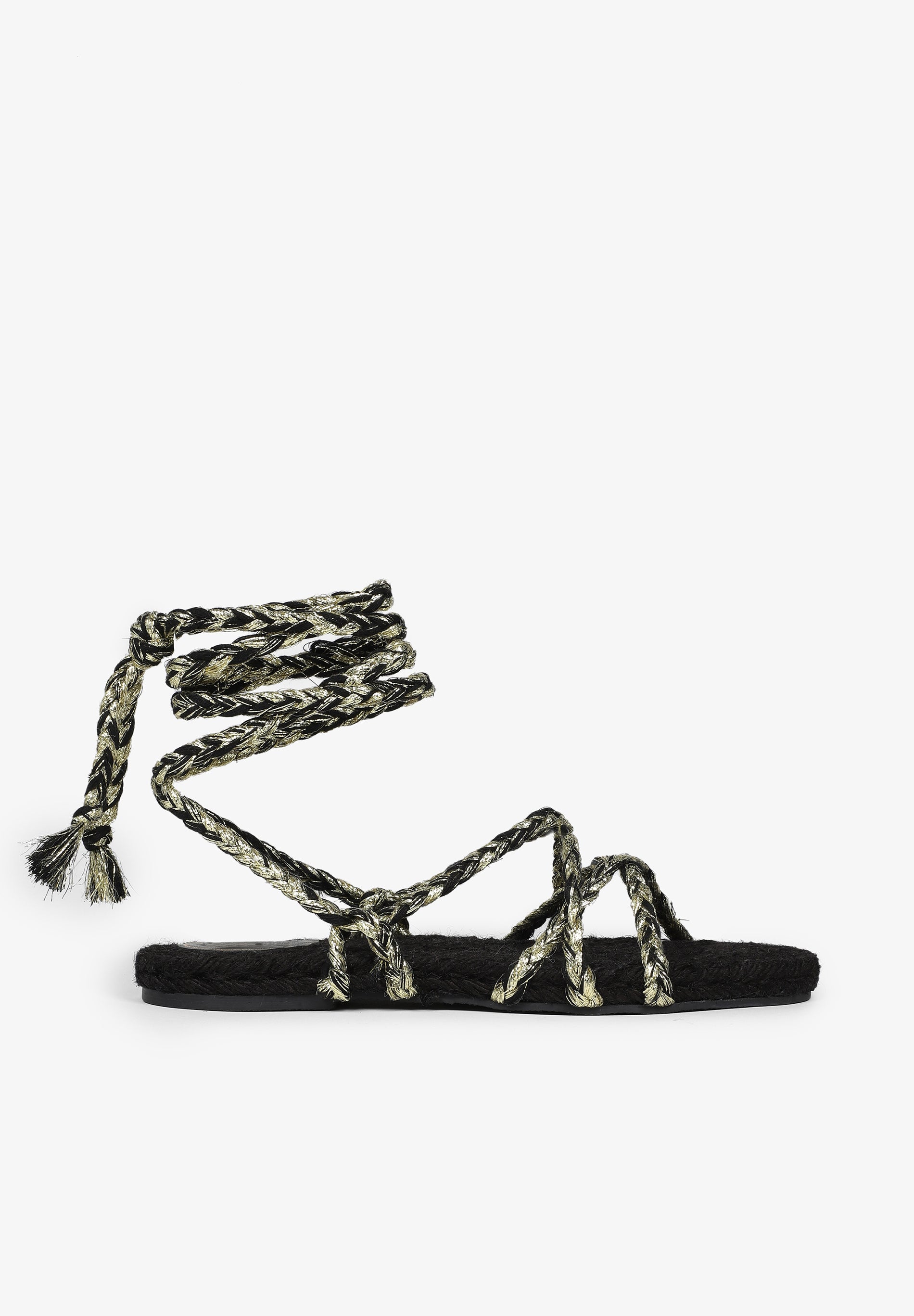 FLAT SANDALS TIED WITH BRAIDED CORDS
