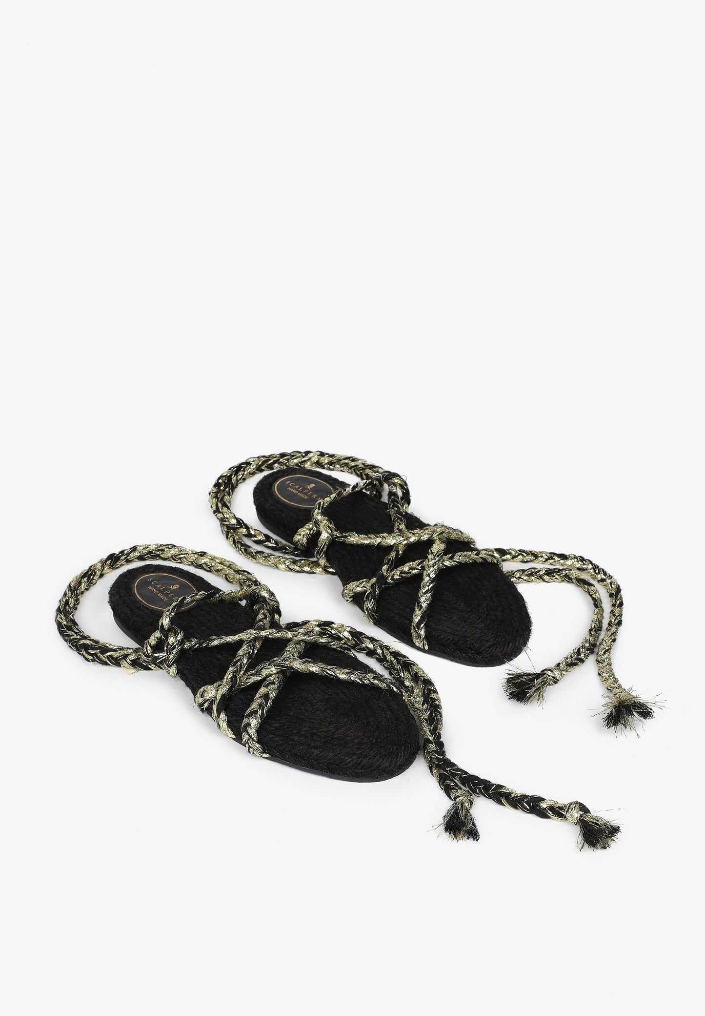 FLAT SANDALS TIED WITH BRAIDED CORDS