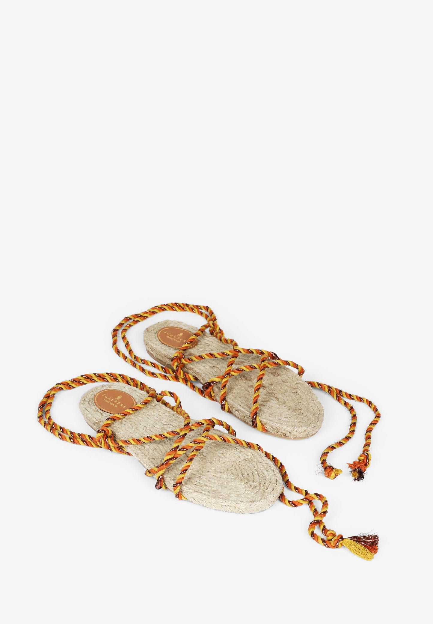 FLAT SANDALS TIED WITH BRAIDED CORDS