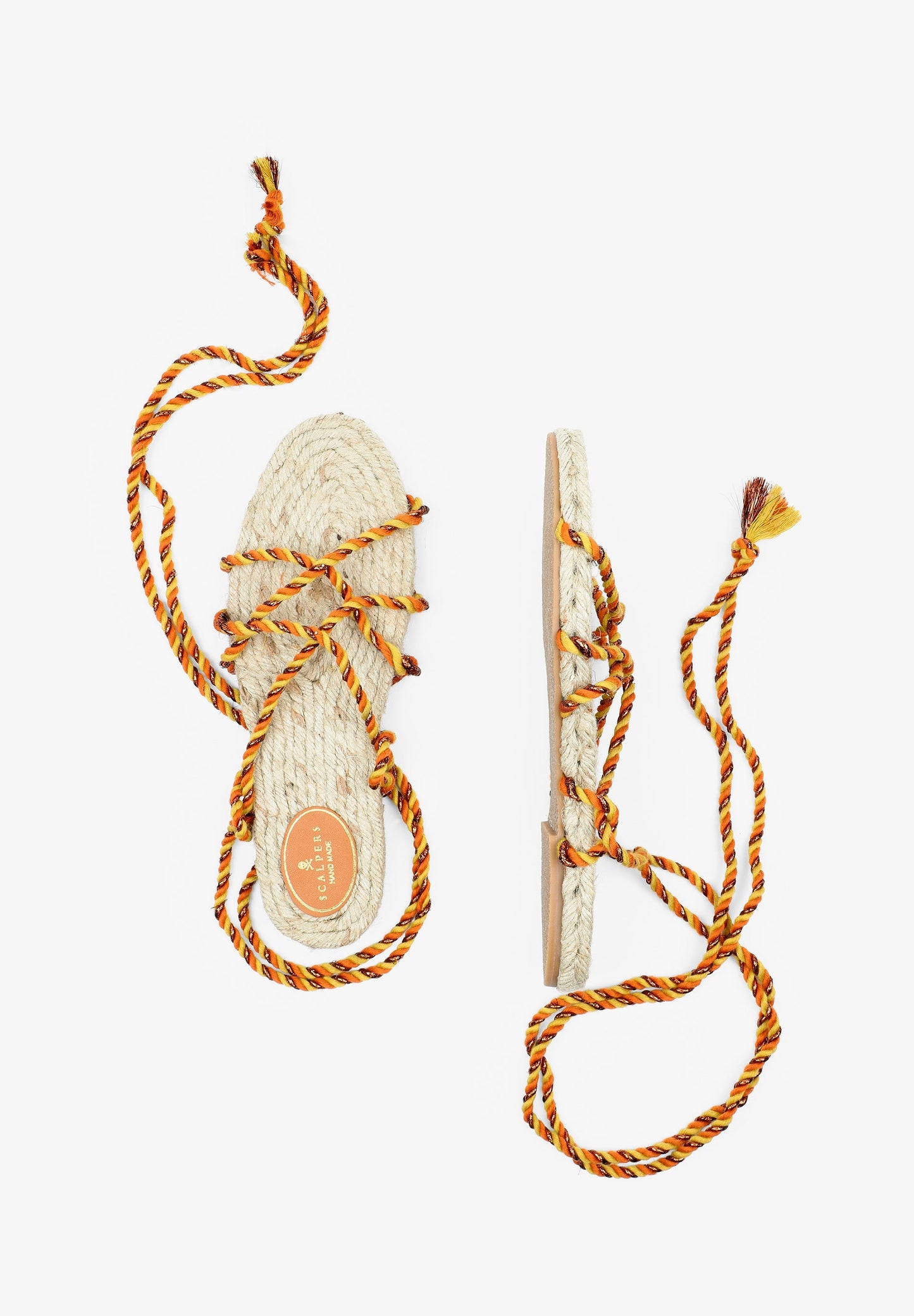 FLAT SANDALS TIED WITH BRAIDED CORDS