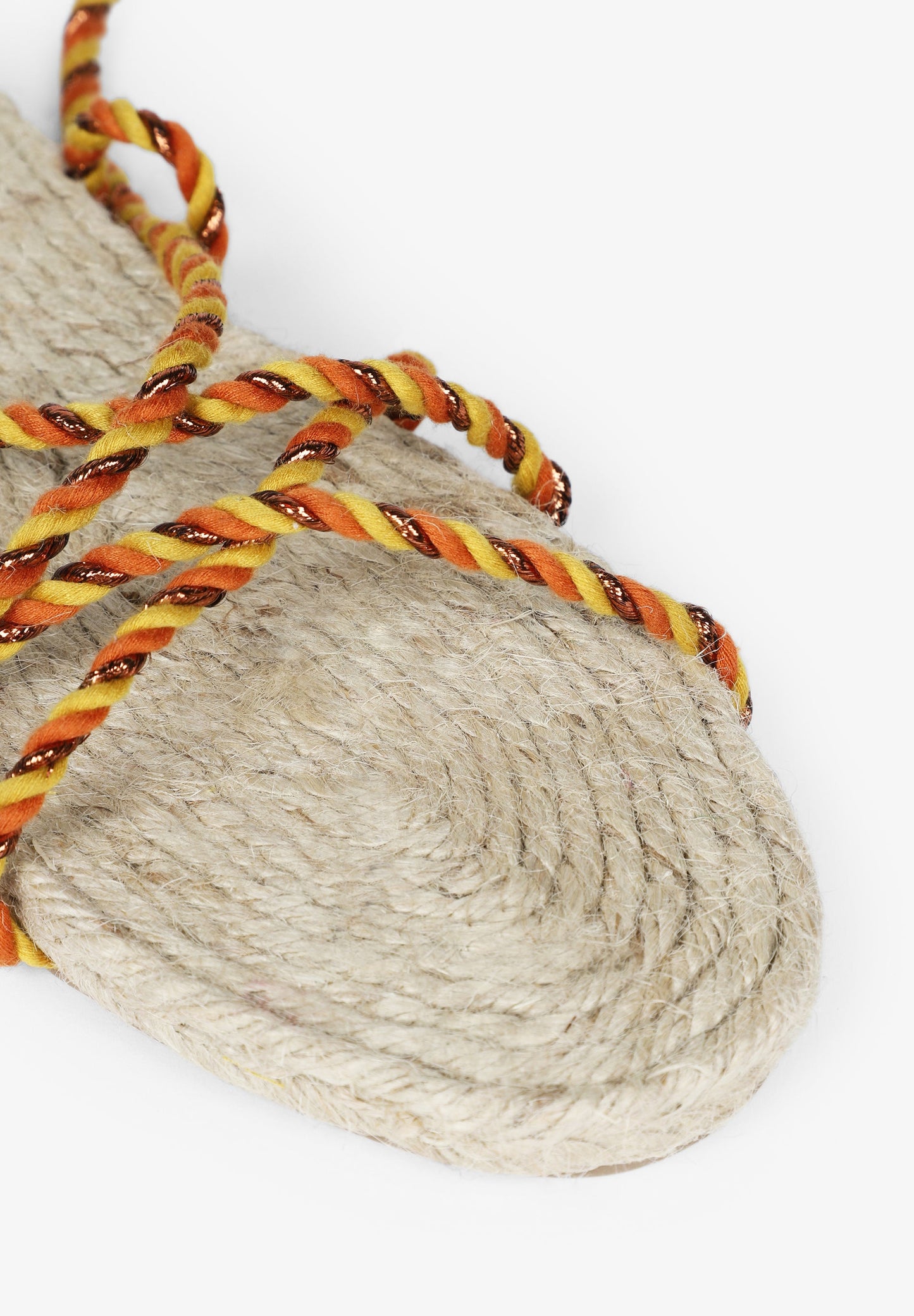 FLAT SANDALS TIED WITH BRAIDED CORDS