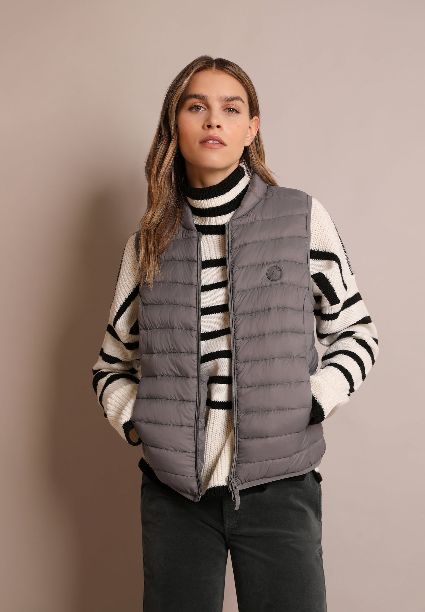 QUILTED GILET WITH SKULL DETAIL