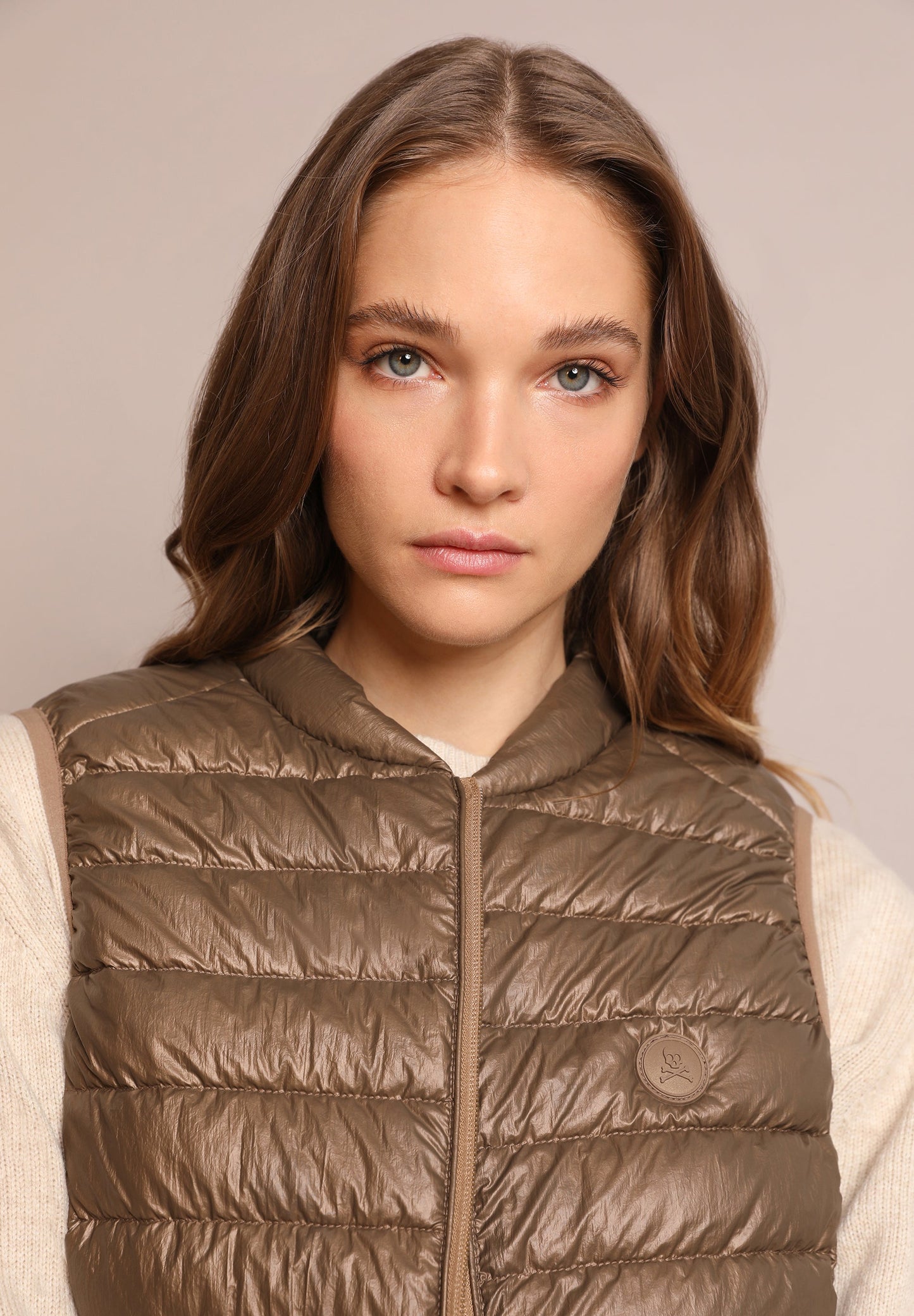 QUILTED GILET WITH SKULL DETAIL