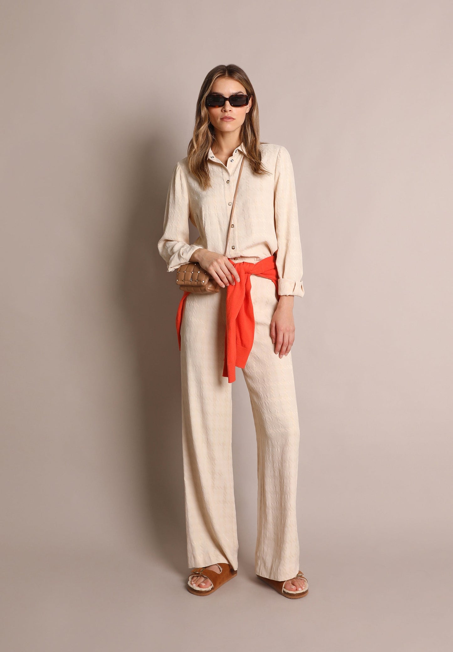 LOOSE-FITTING FLARED TROUSERS