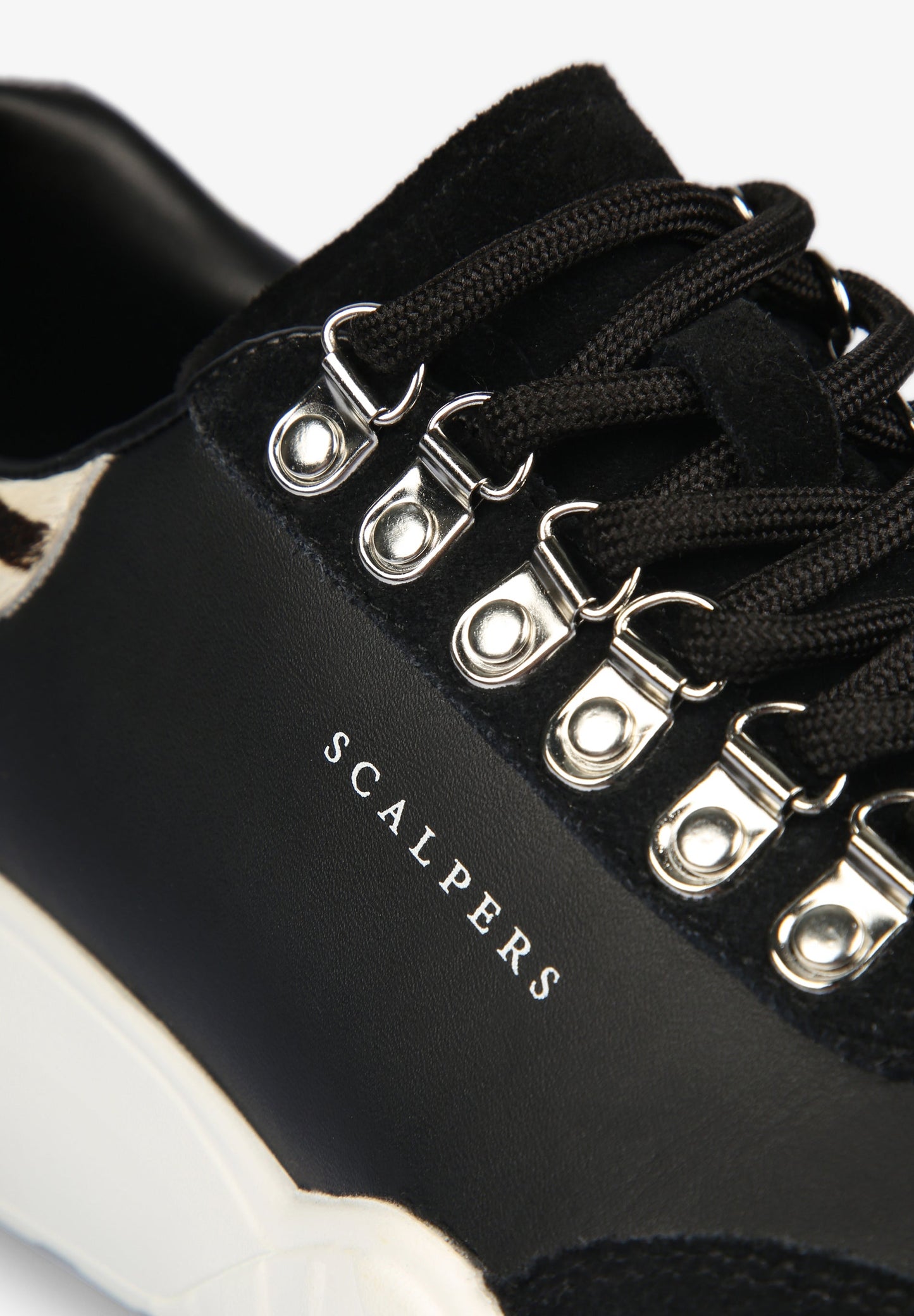 SNEAKERS WITH SPECIAL ANIMAL PRINT SOLES