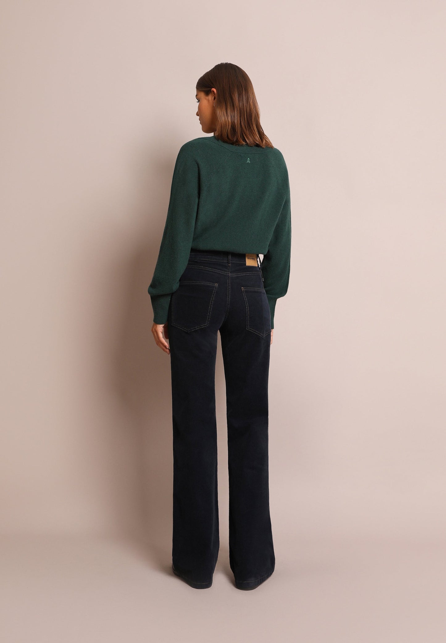 FLARED TROUSERS WITH DOUBLE BUTTON
