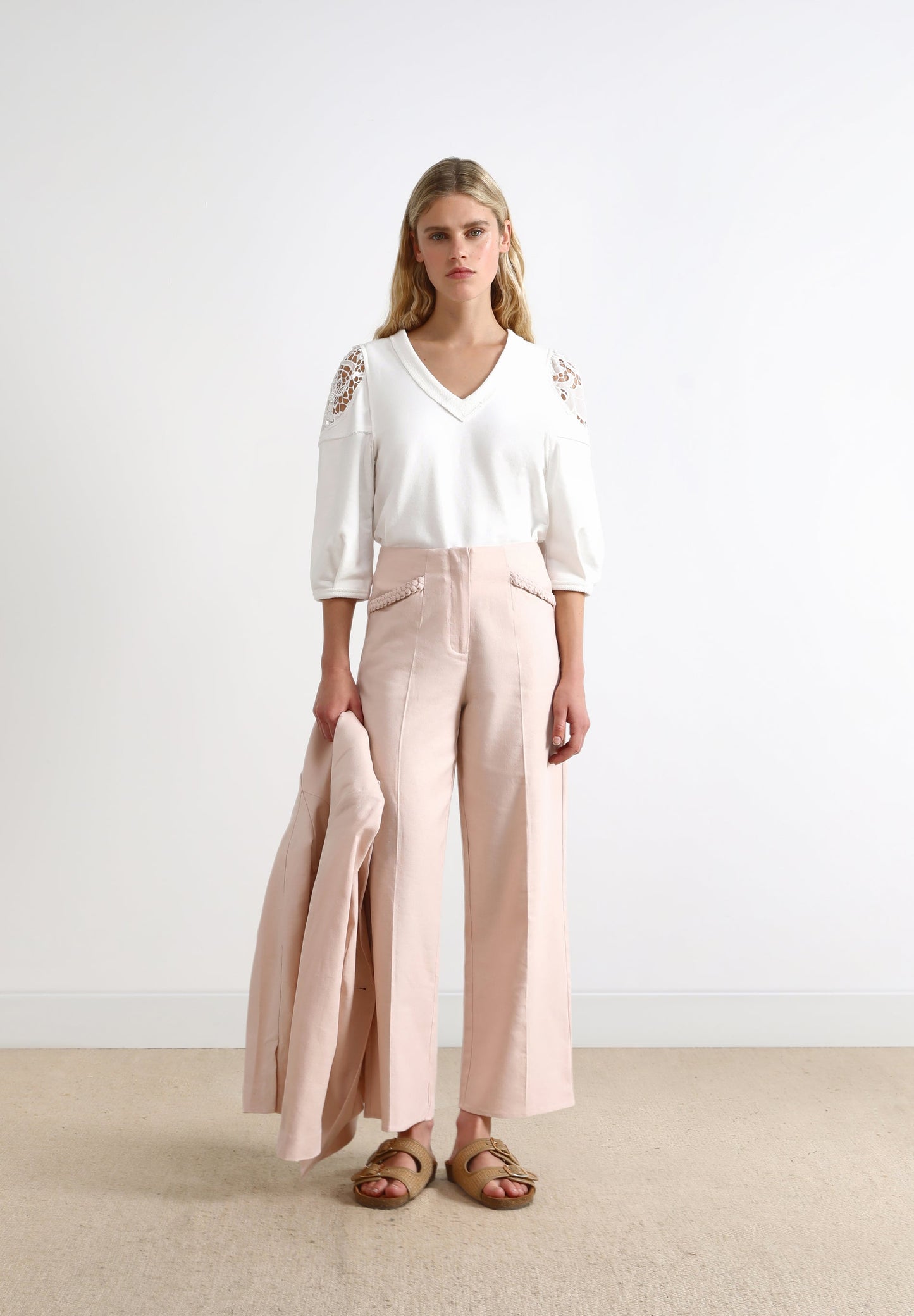 LINEN TROUSERS WITH BRAIDED DETAILS
