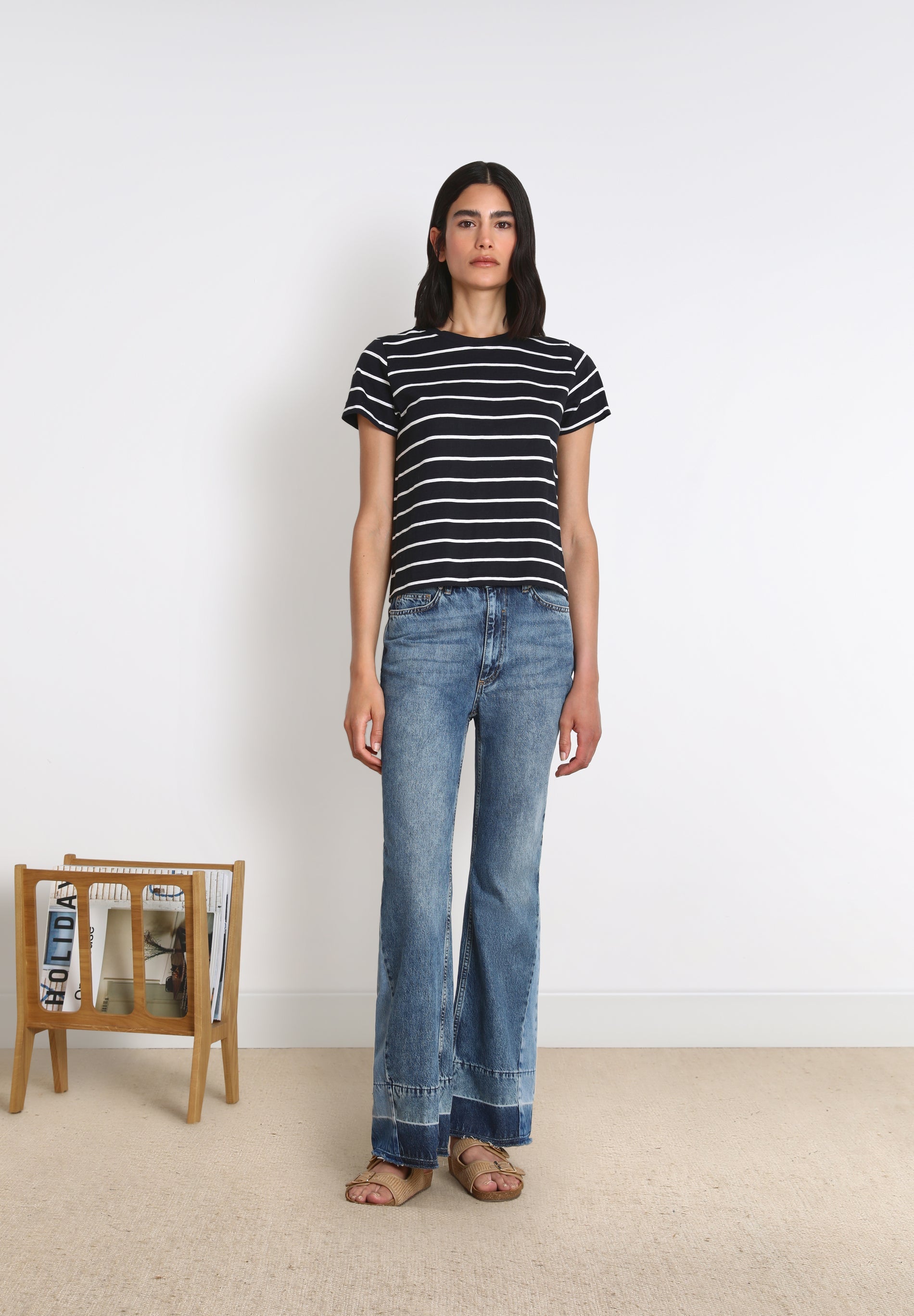 FLARED JEANS WITH PATCH ON THE HEM