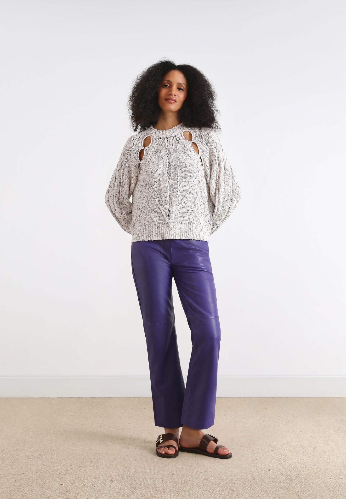 SWEATER WITH SLIT DETAILS