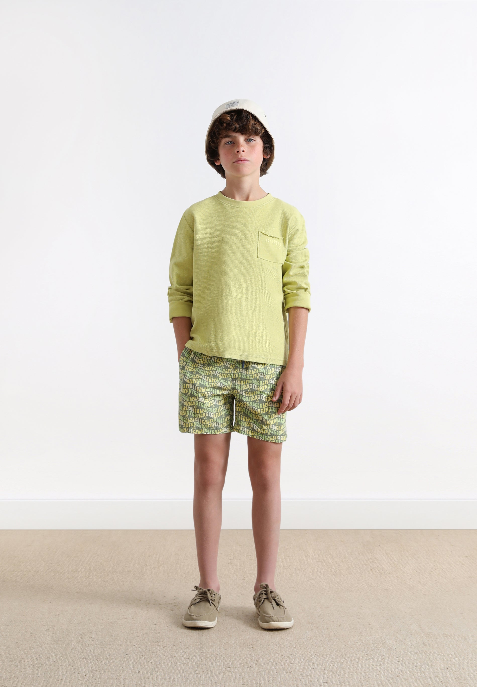 SWIMMING TRUNKS WITH ALL-OVER LOGO