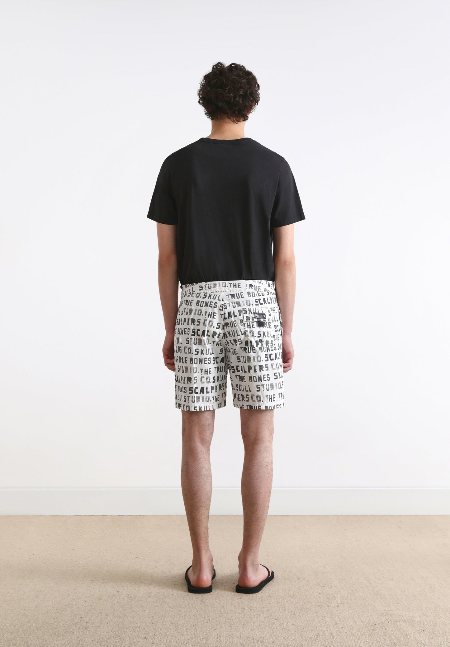 SWIMMING TRUNKS WITH TEXT PRINT