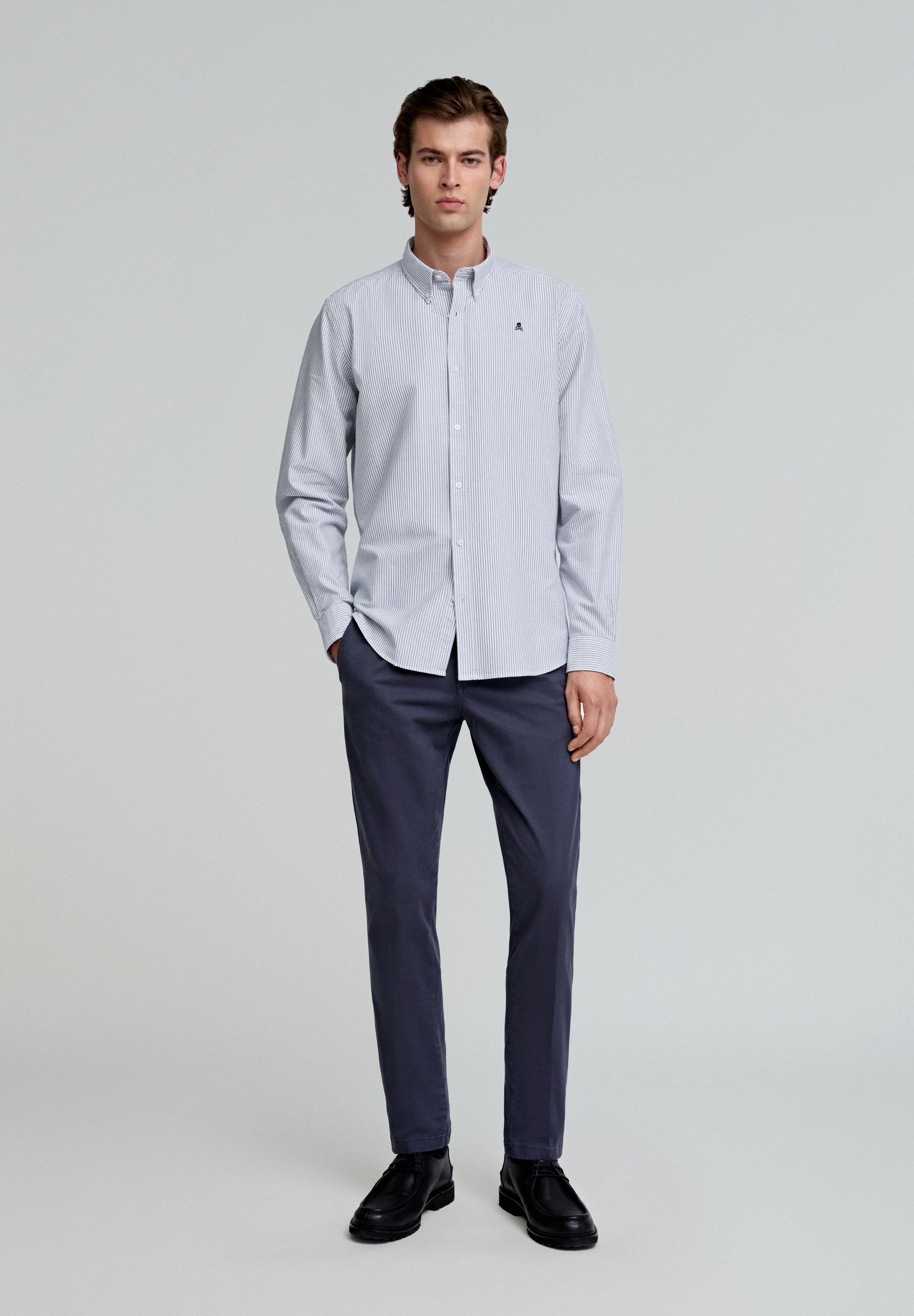 PLEATED CHINOS