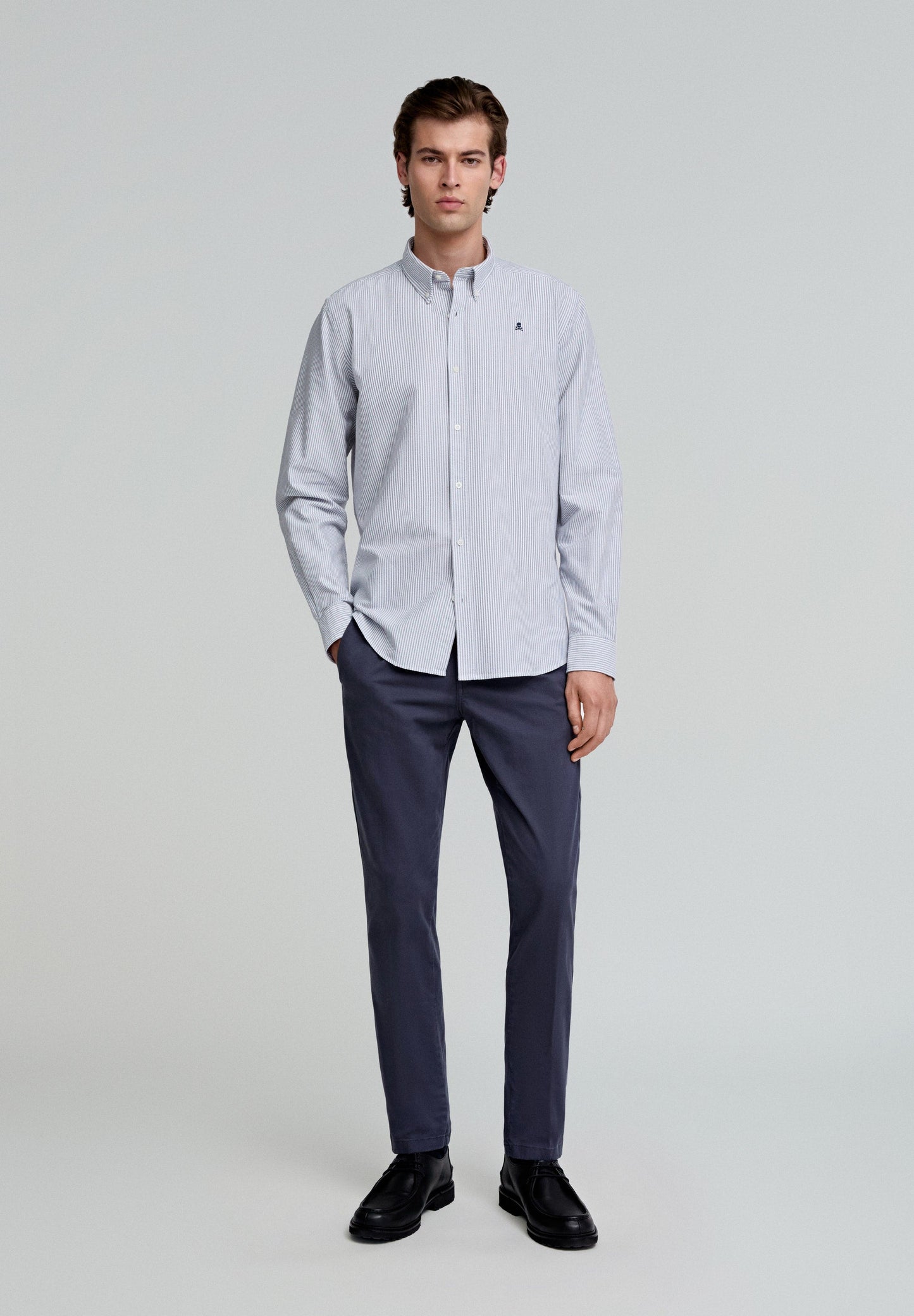 PLEATED CHINOS