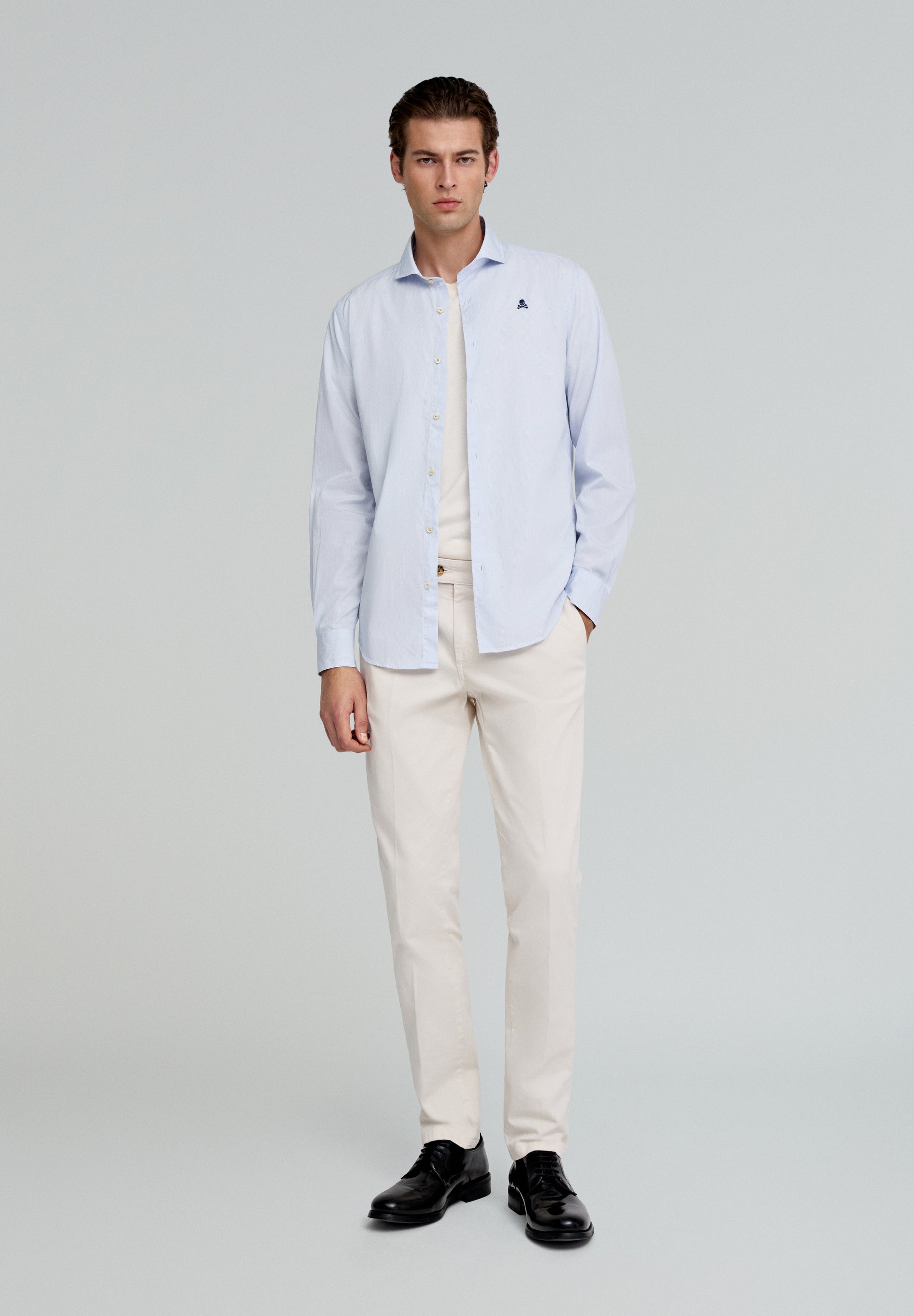 PLEATED CHINOS