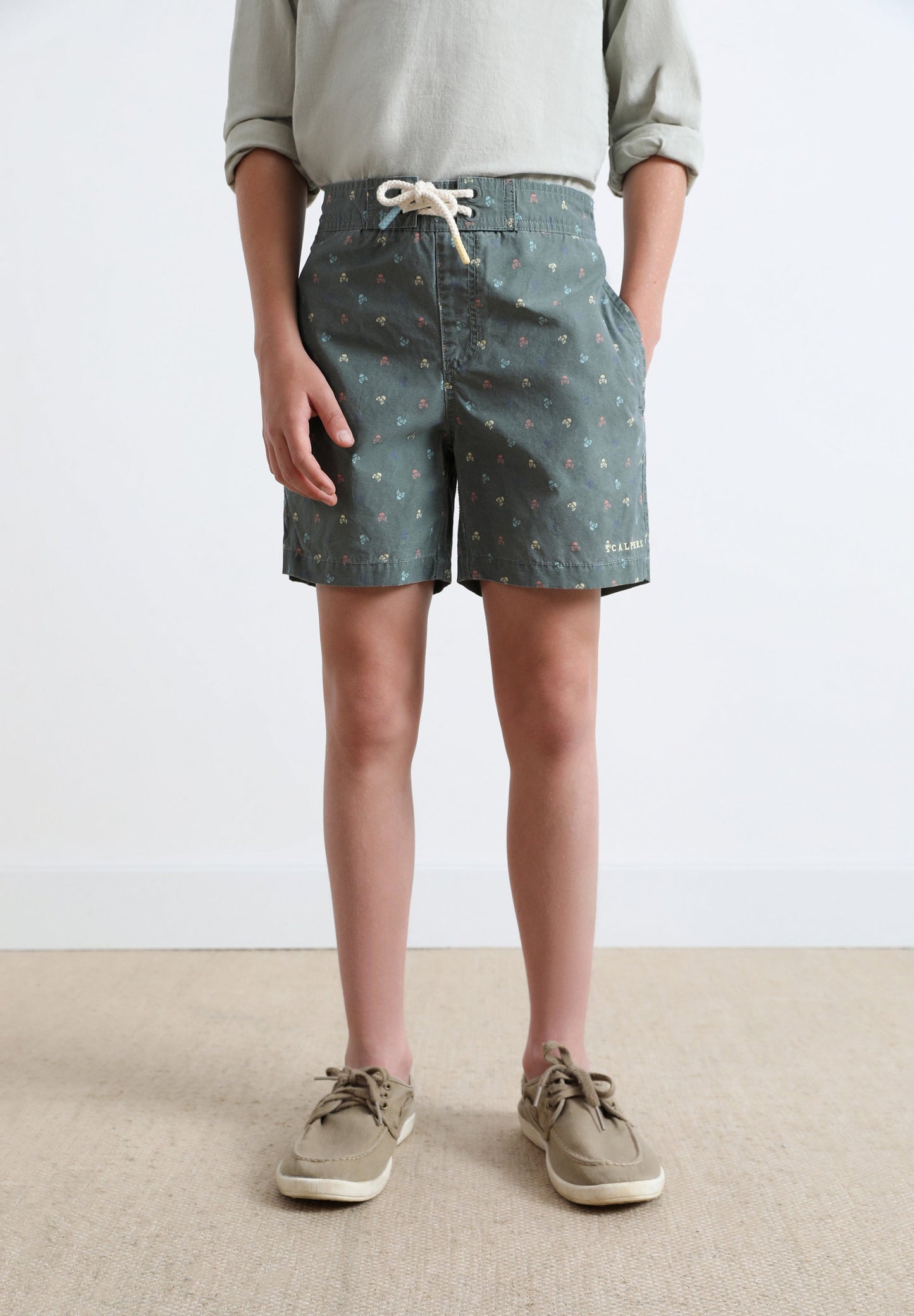 SWIMMING TRUNKS WITH ALL-OVER SKULLS