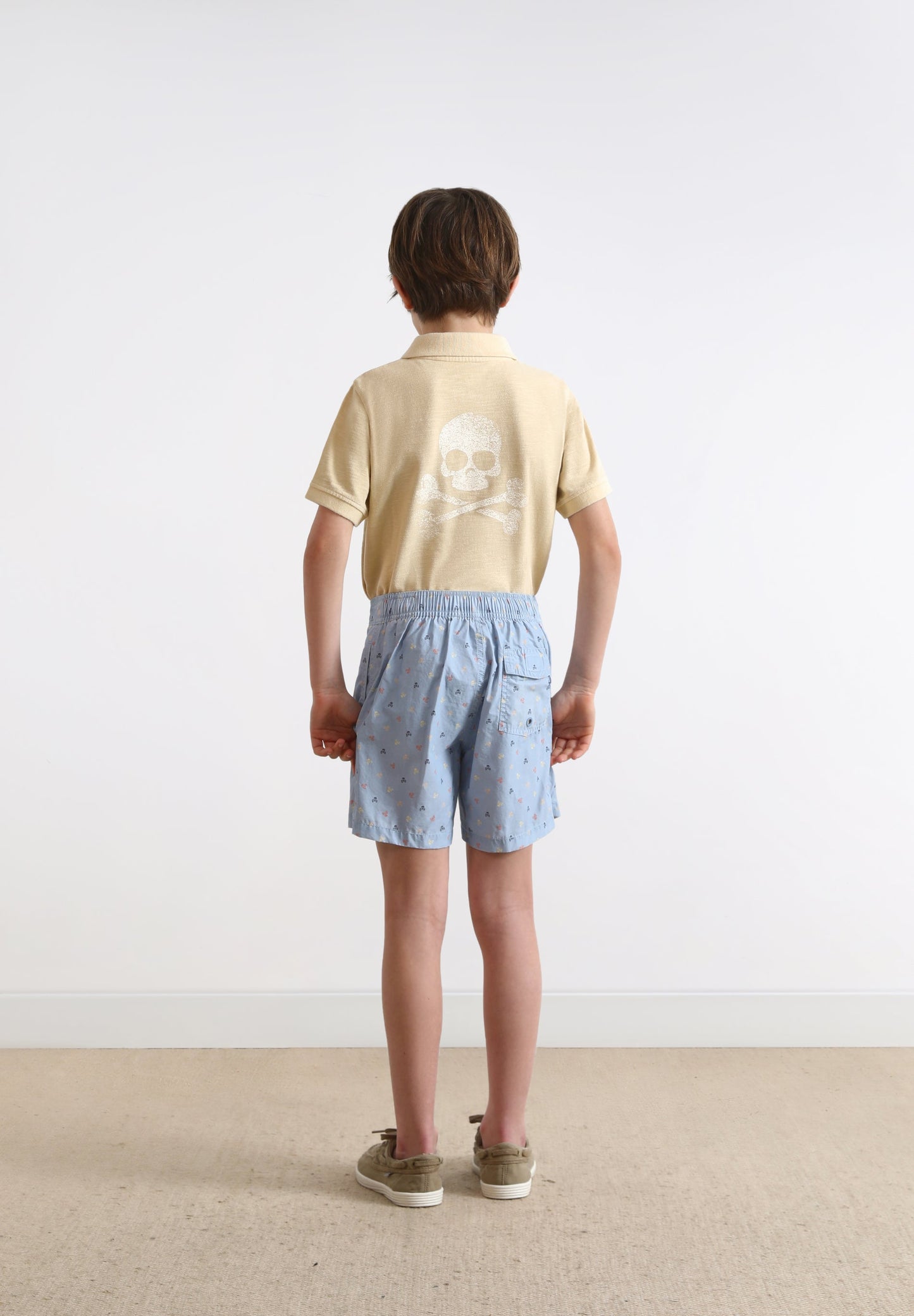 SWIMMING TRUNKS WITH ALL-OVER SKULLS