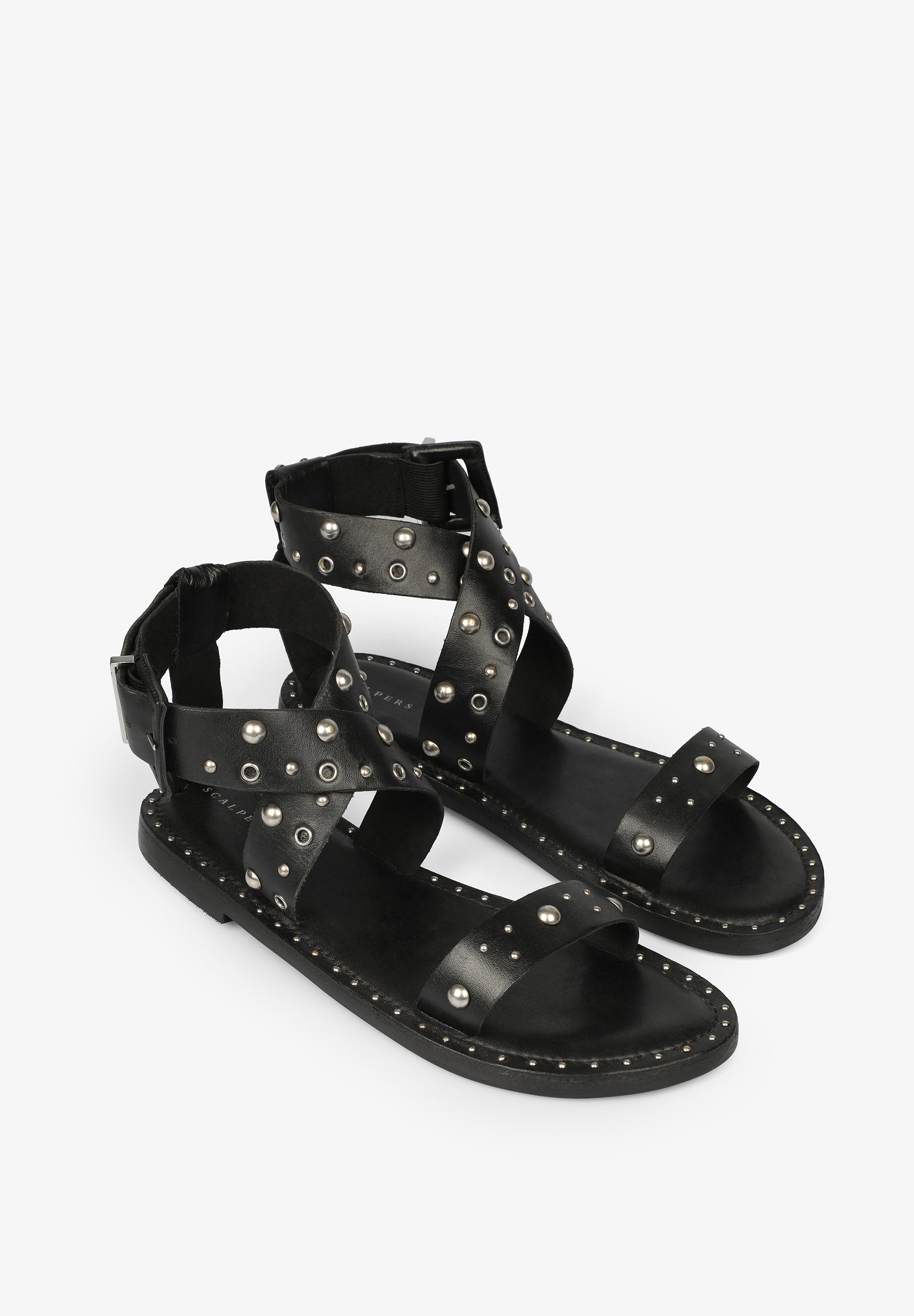CROSSOVER SANDALS WITH STUDS