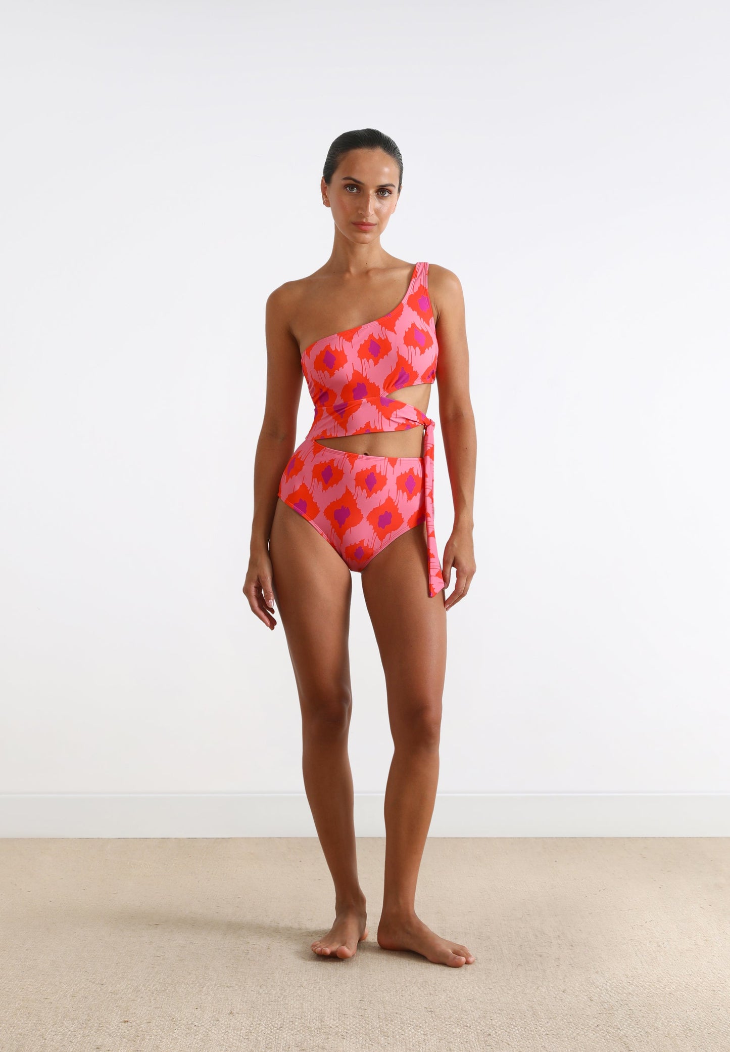 ASYMMETRIC CUT OUT SWIMSUIT
