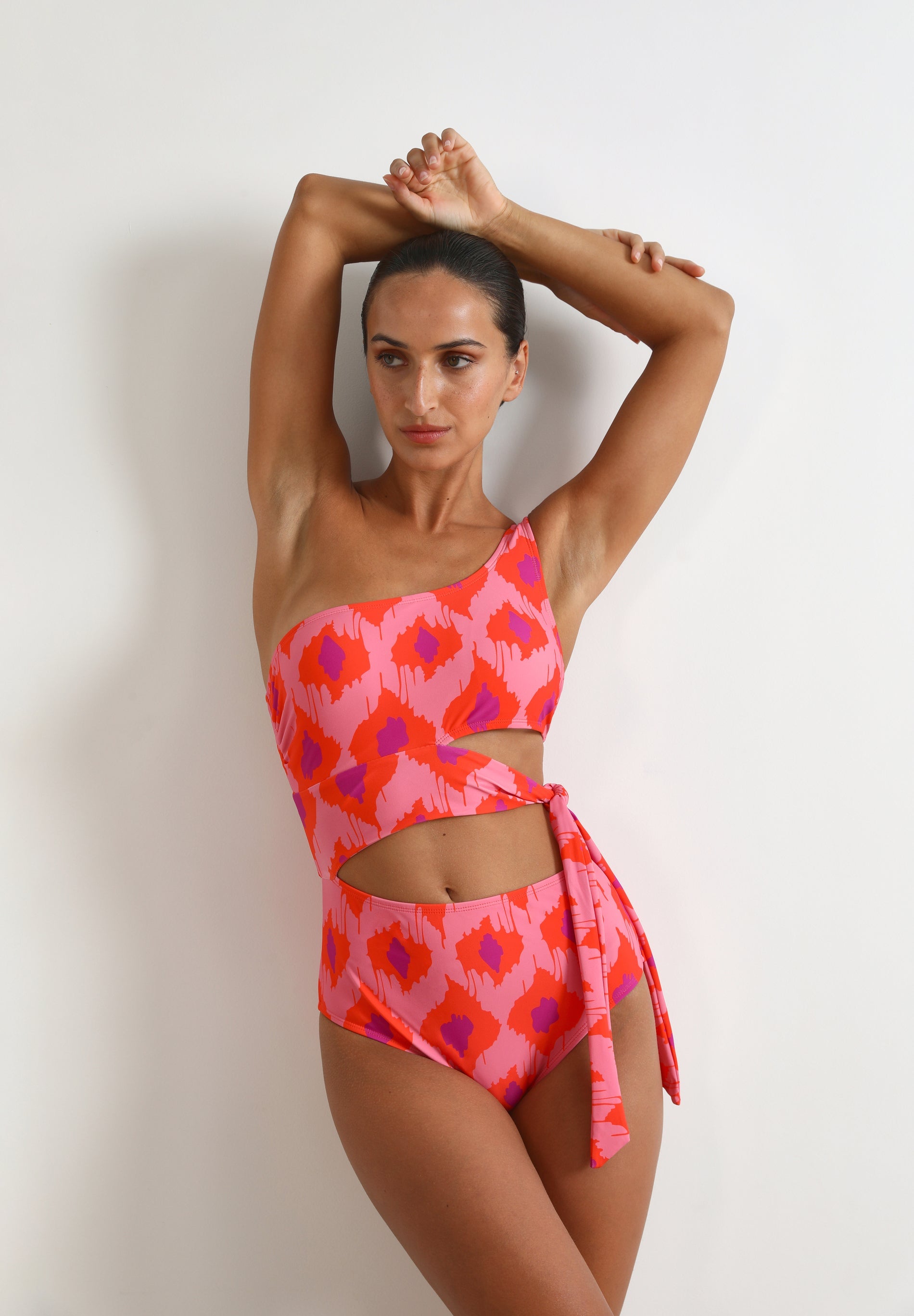 ASYMMETRIC CUT OUT SWIMSUIT
