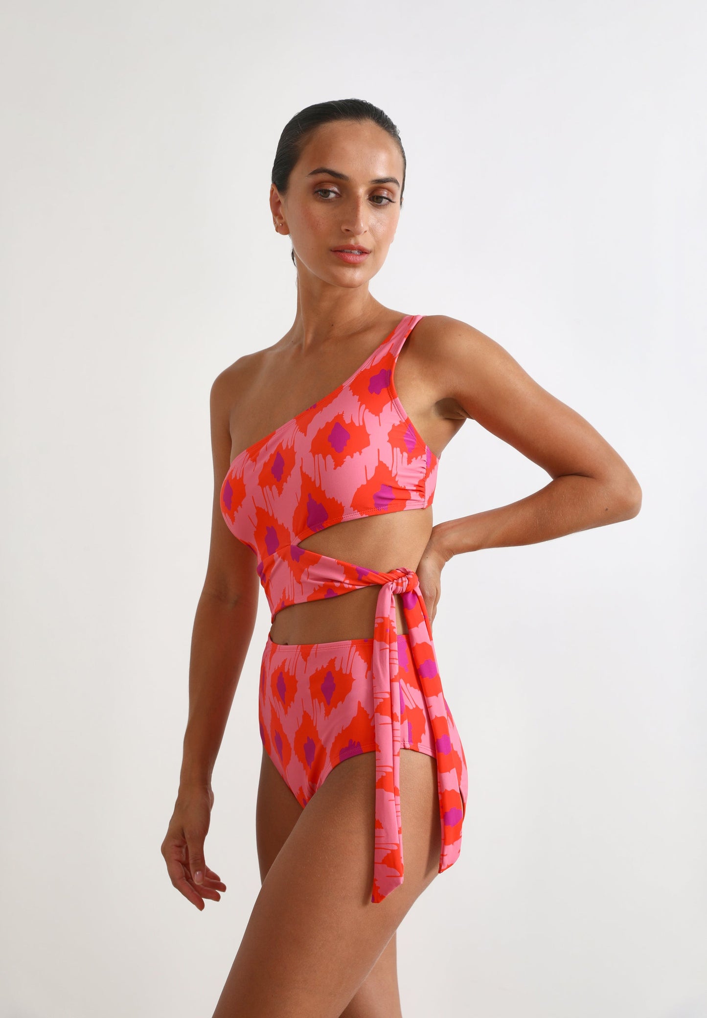 ASYMMETRIC CUT OUT SWIMSUIT