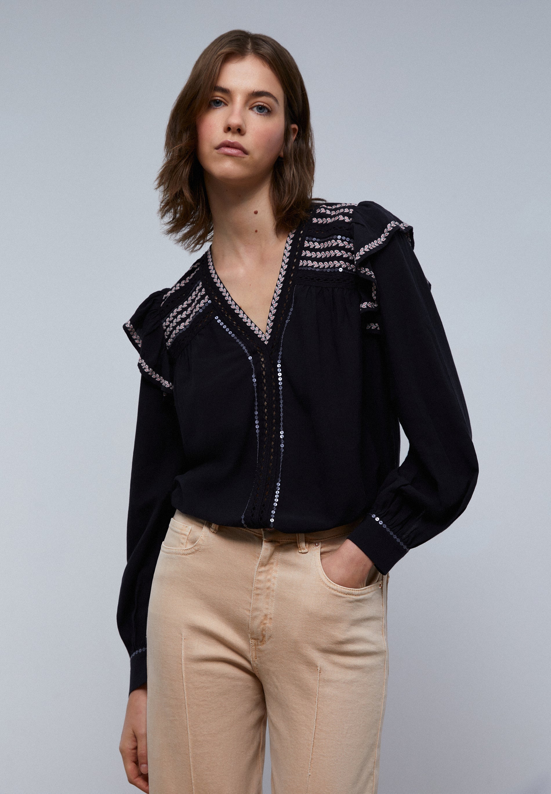 BLOUSE WITH RUFFLED SHOULDER