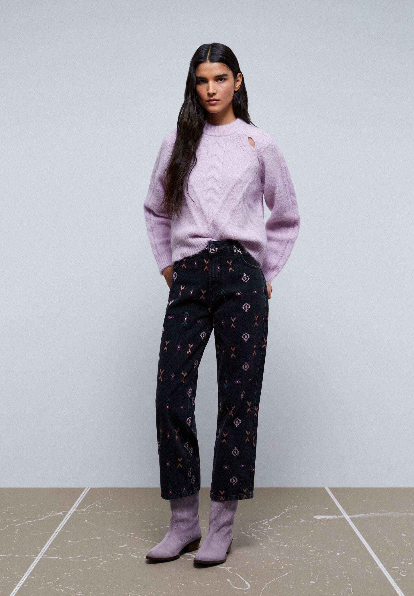 KNIT SWEATER WITH OPENINGS