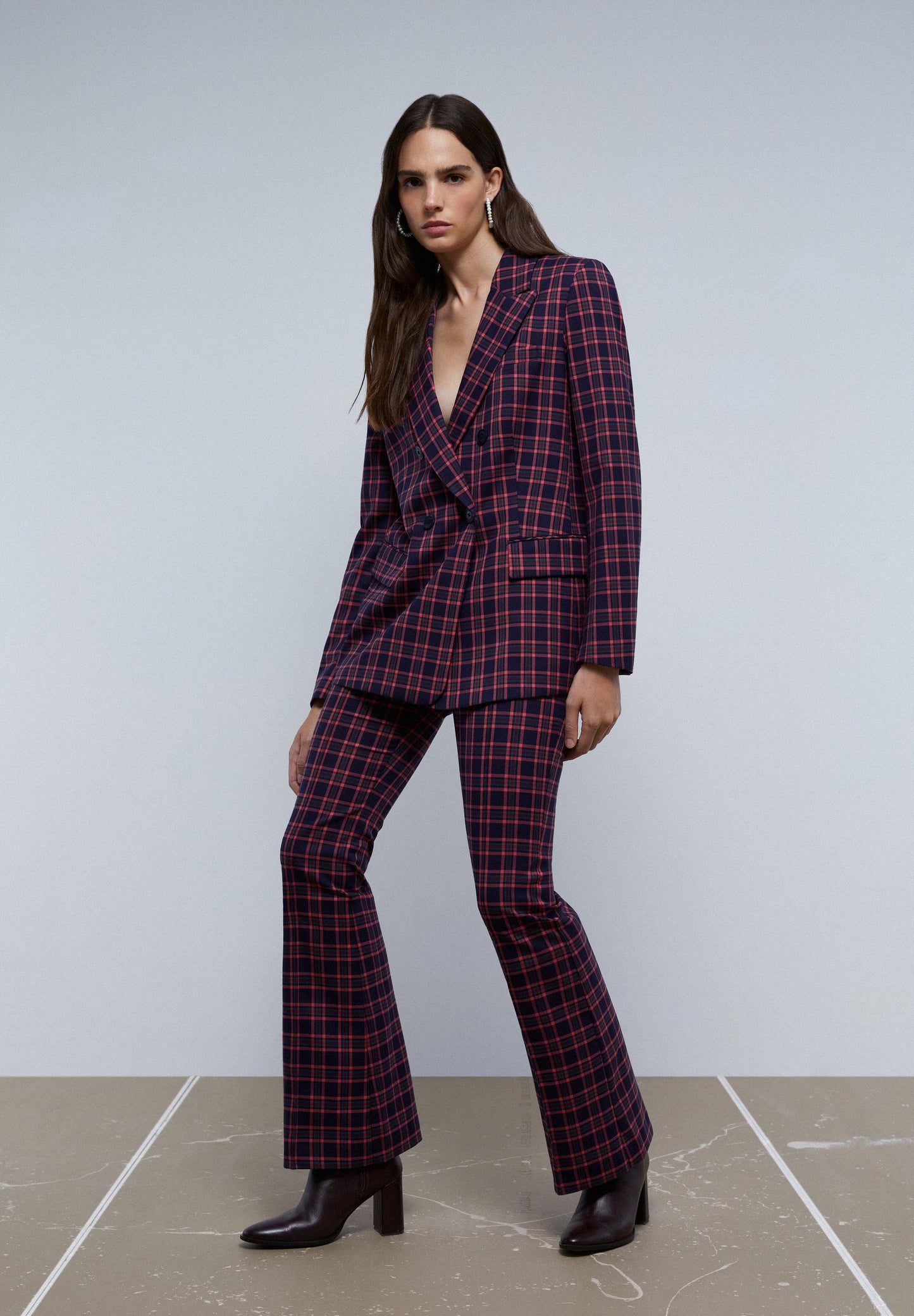 FLARED CHECK TROUSERS