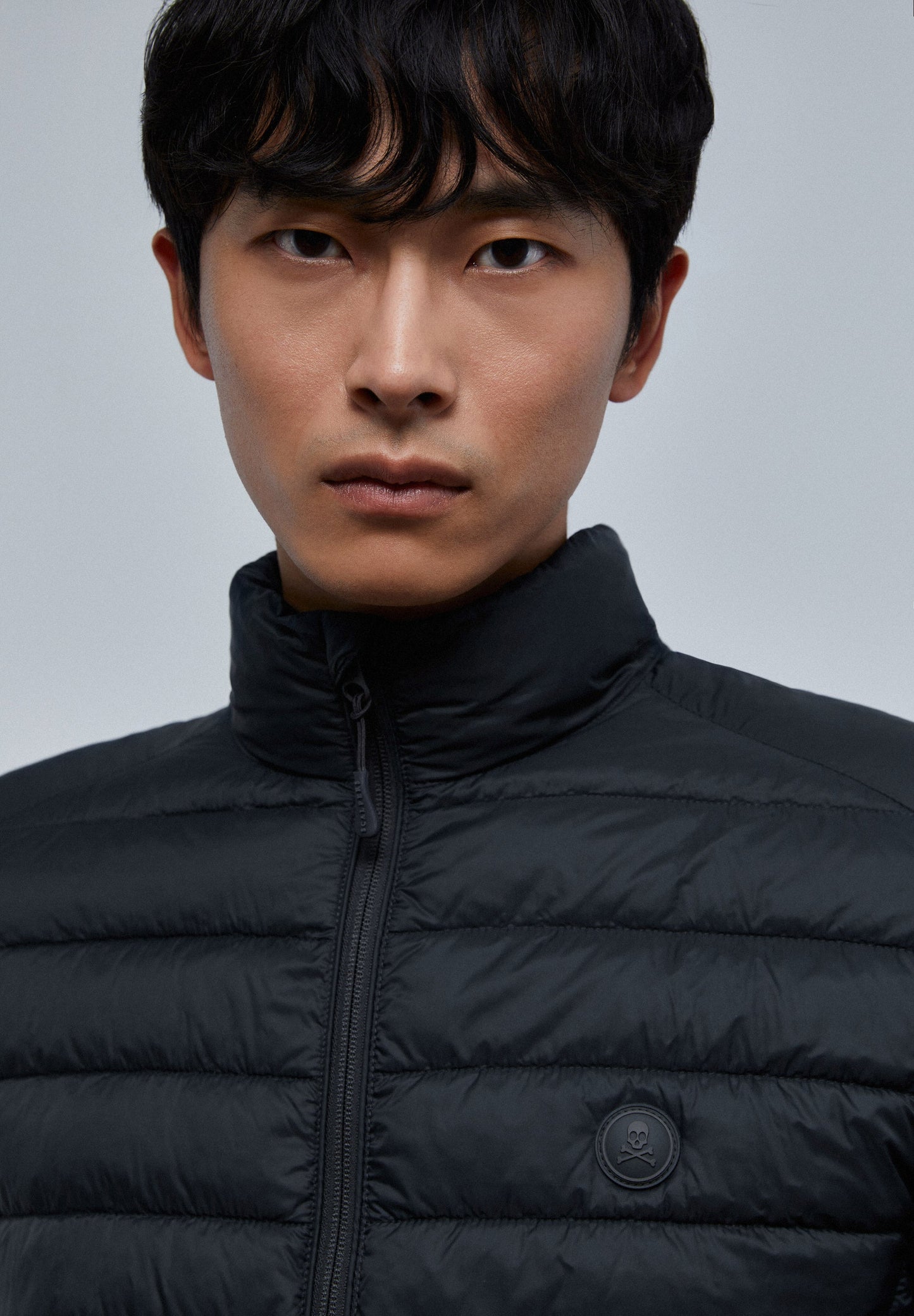 QUILTED JACKET WITH SKULL DETAIL