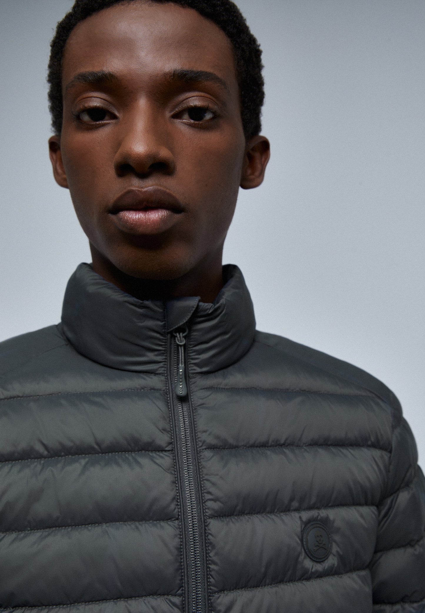 QUILTED JACKET WITH SKULL DETAIL