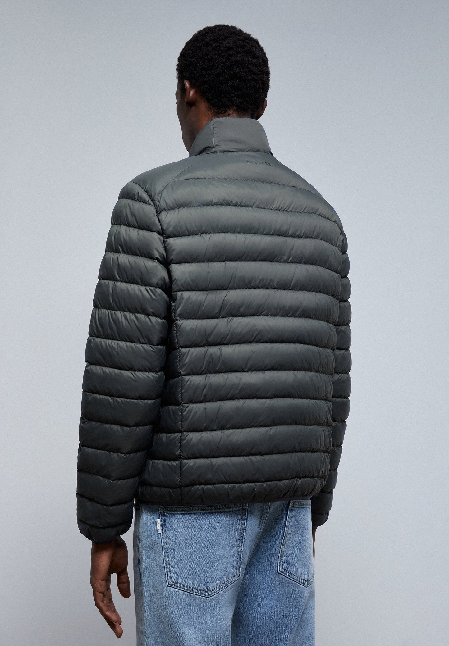 QUILTED JACKET WITH SKULL DETAIL