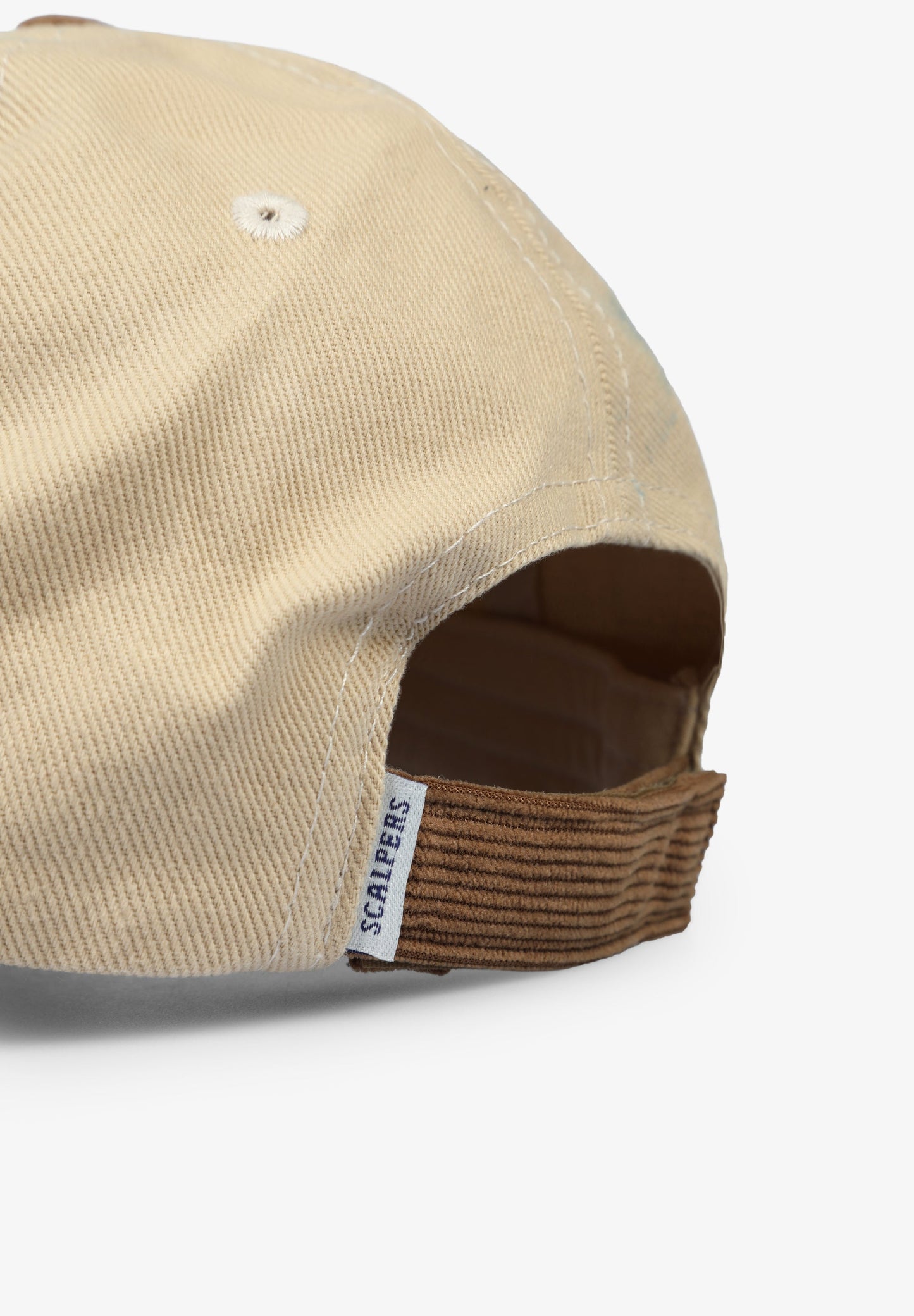 CAP WITH CORDUROY DETAILS