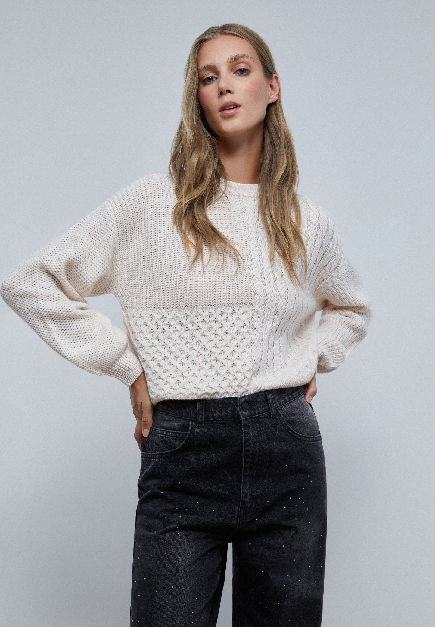 CABLE-KNIT SWEATER
