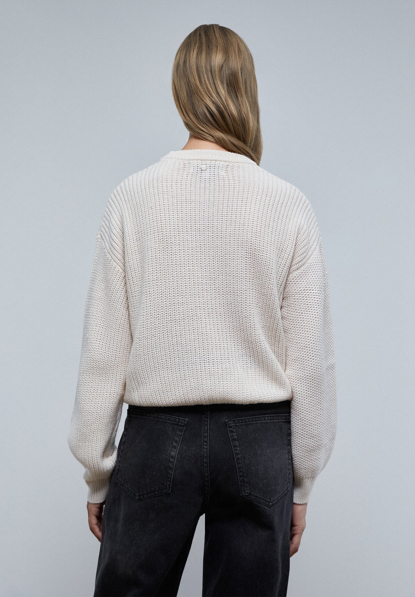 CABLE-KNIT SWEATER