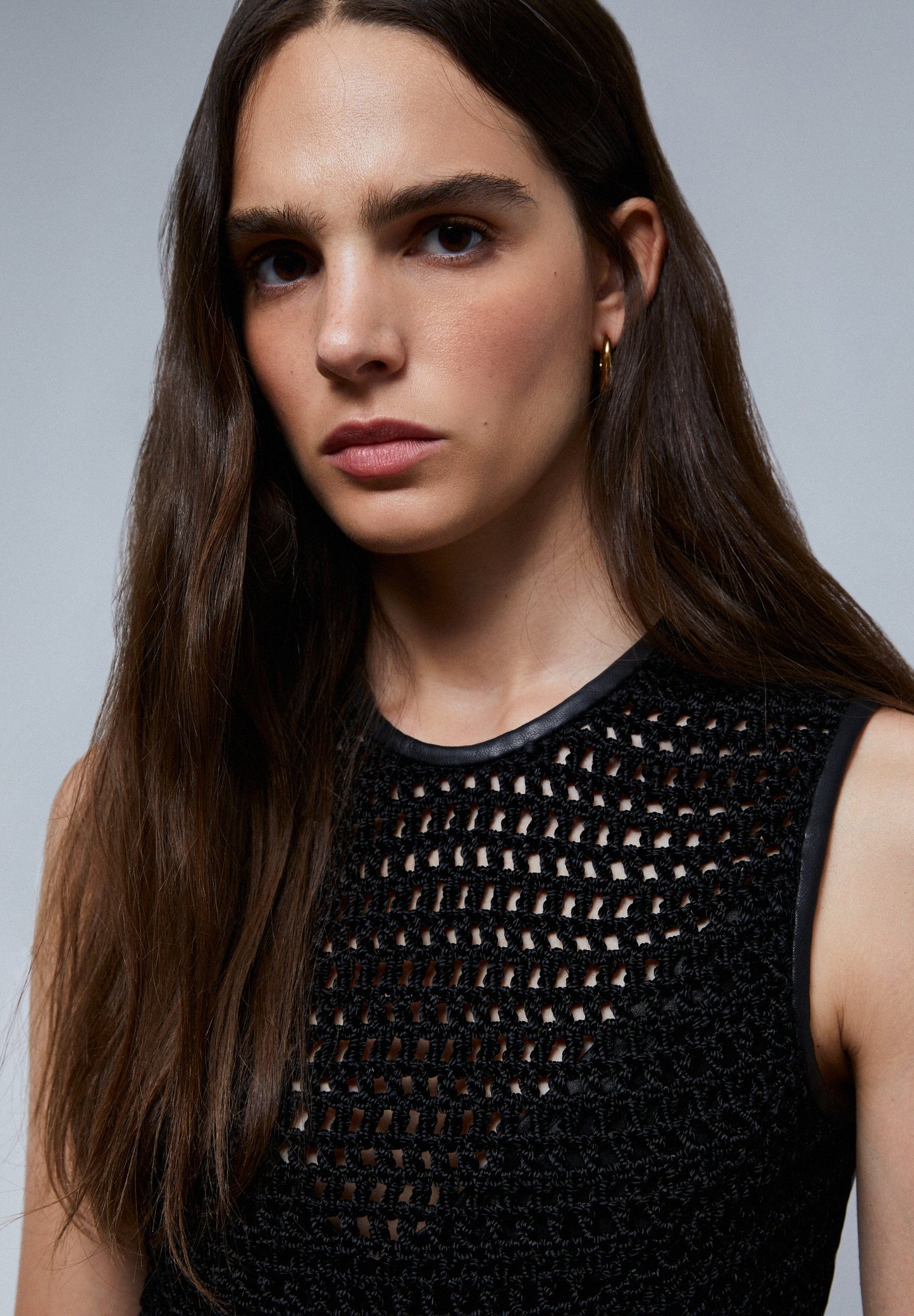 LEATHER TOP WITH BACK DETAIL