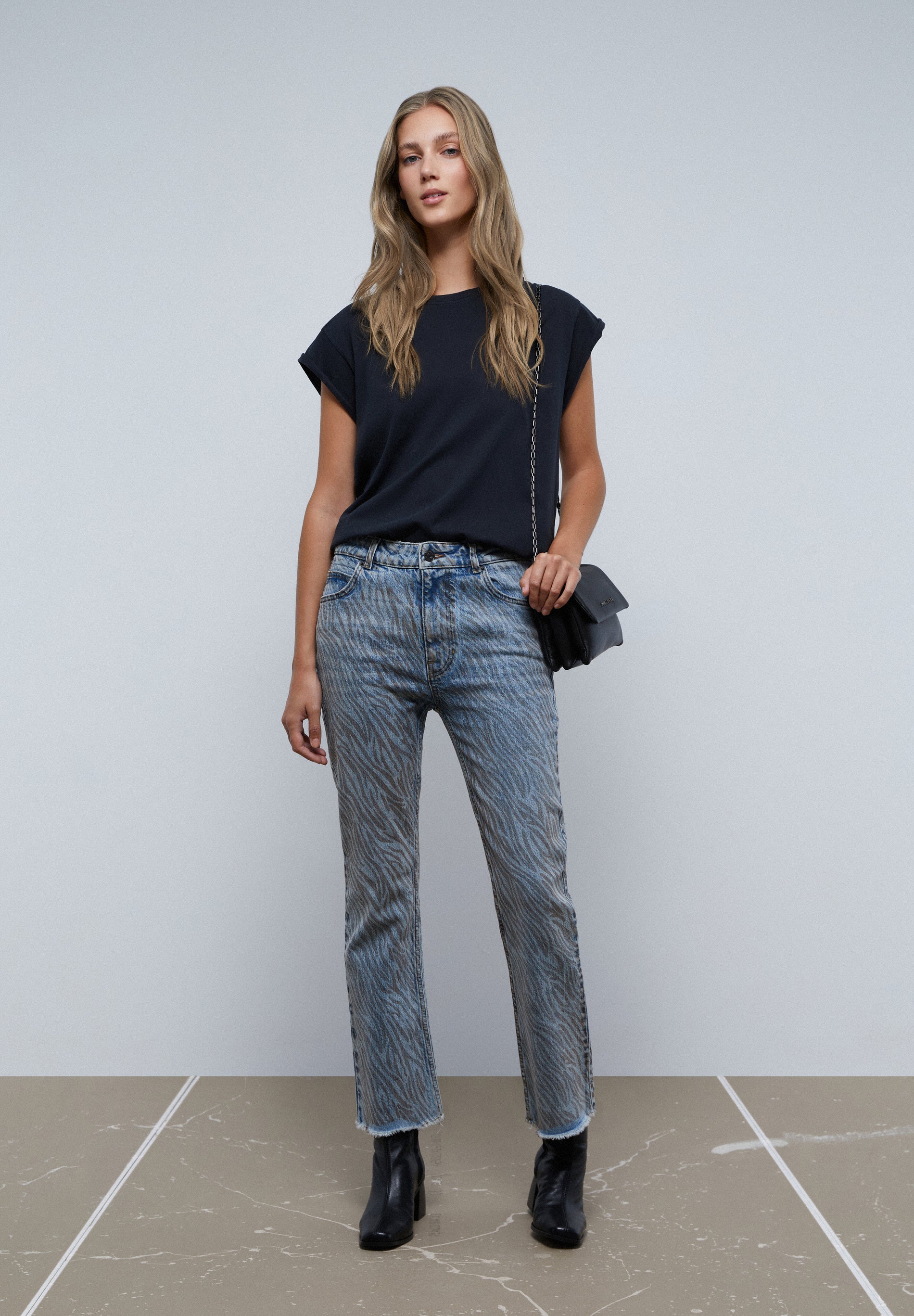 ANIMAL PRINT FLARED ANKLE JEANS