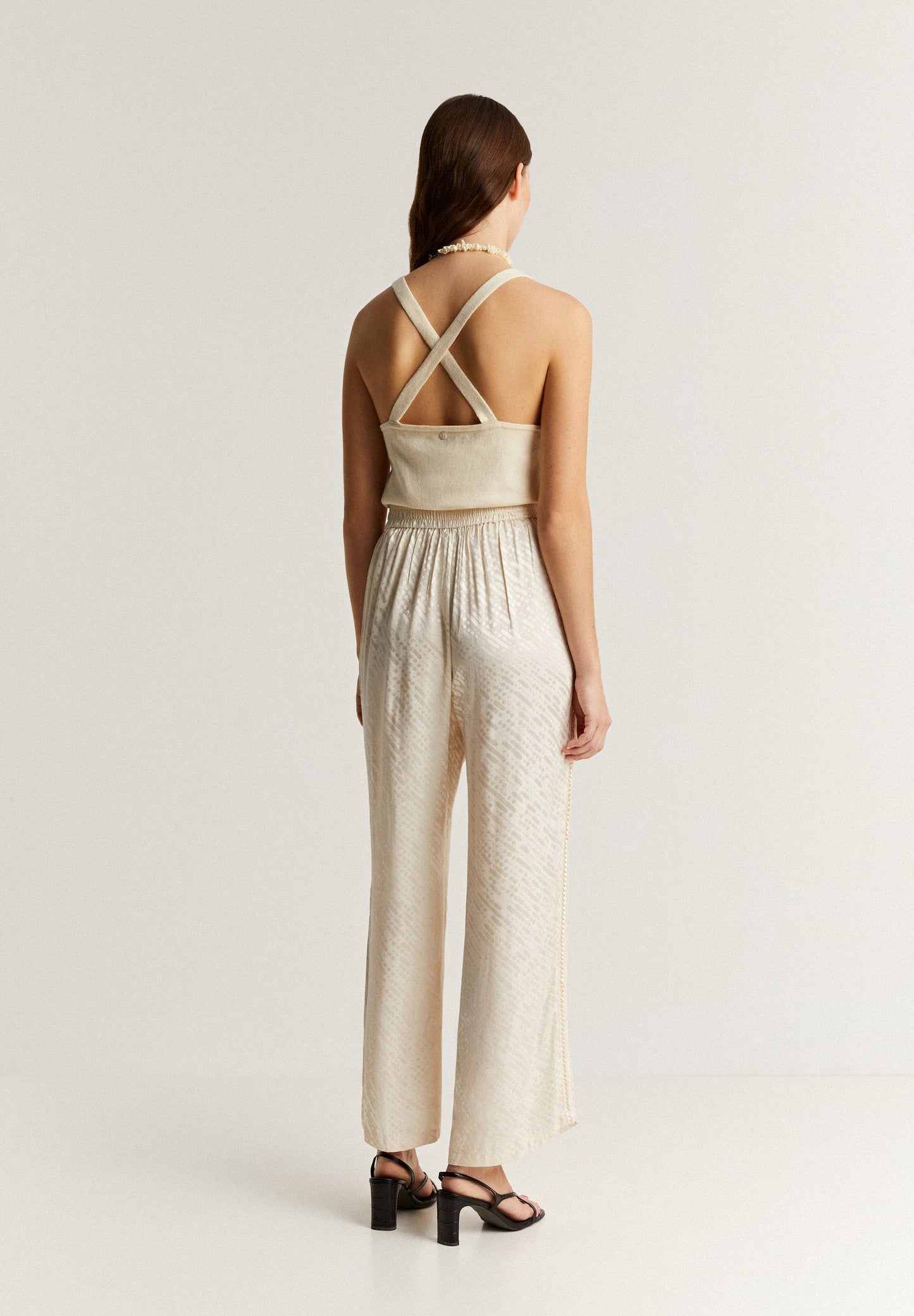 JACQUARD TROUSERS WITH METALLIC DETAILS