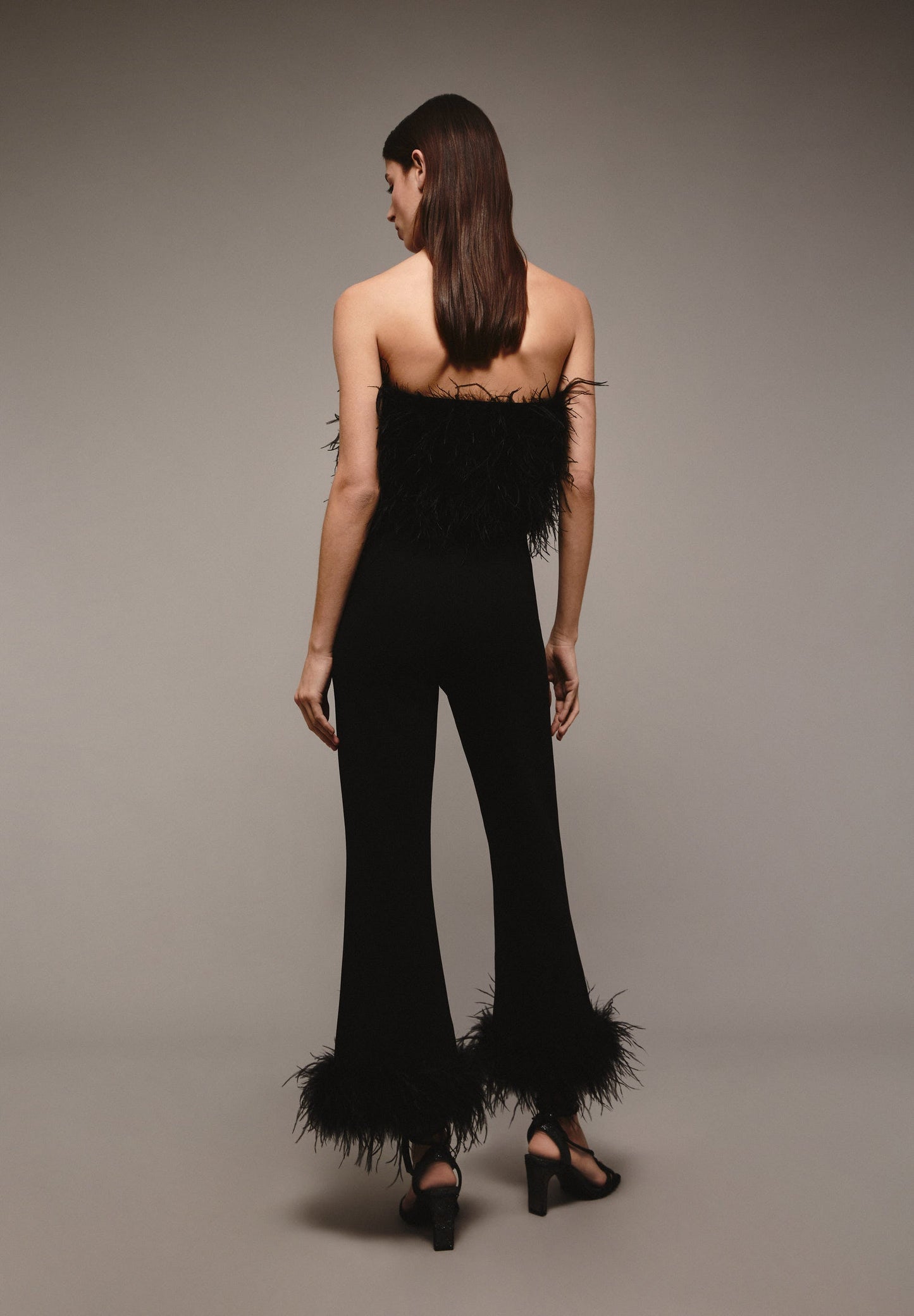 TROUSERS WITH FEATHERED HEM DETAIL