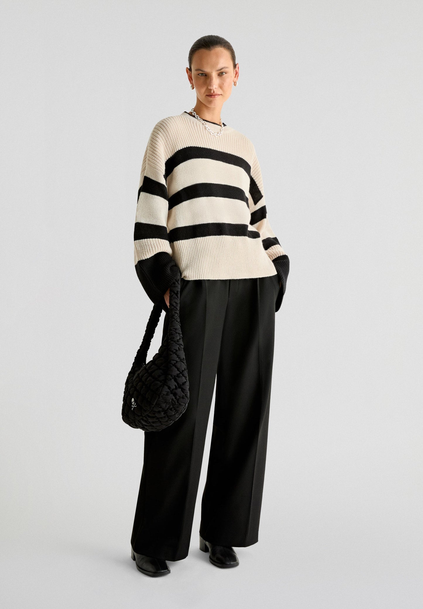 STRIPED SWEATER WITH FLARED SLEEVES