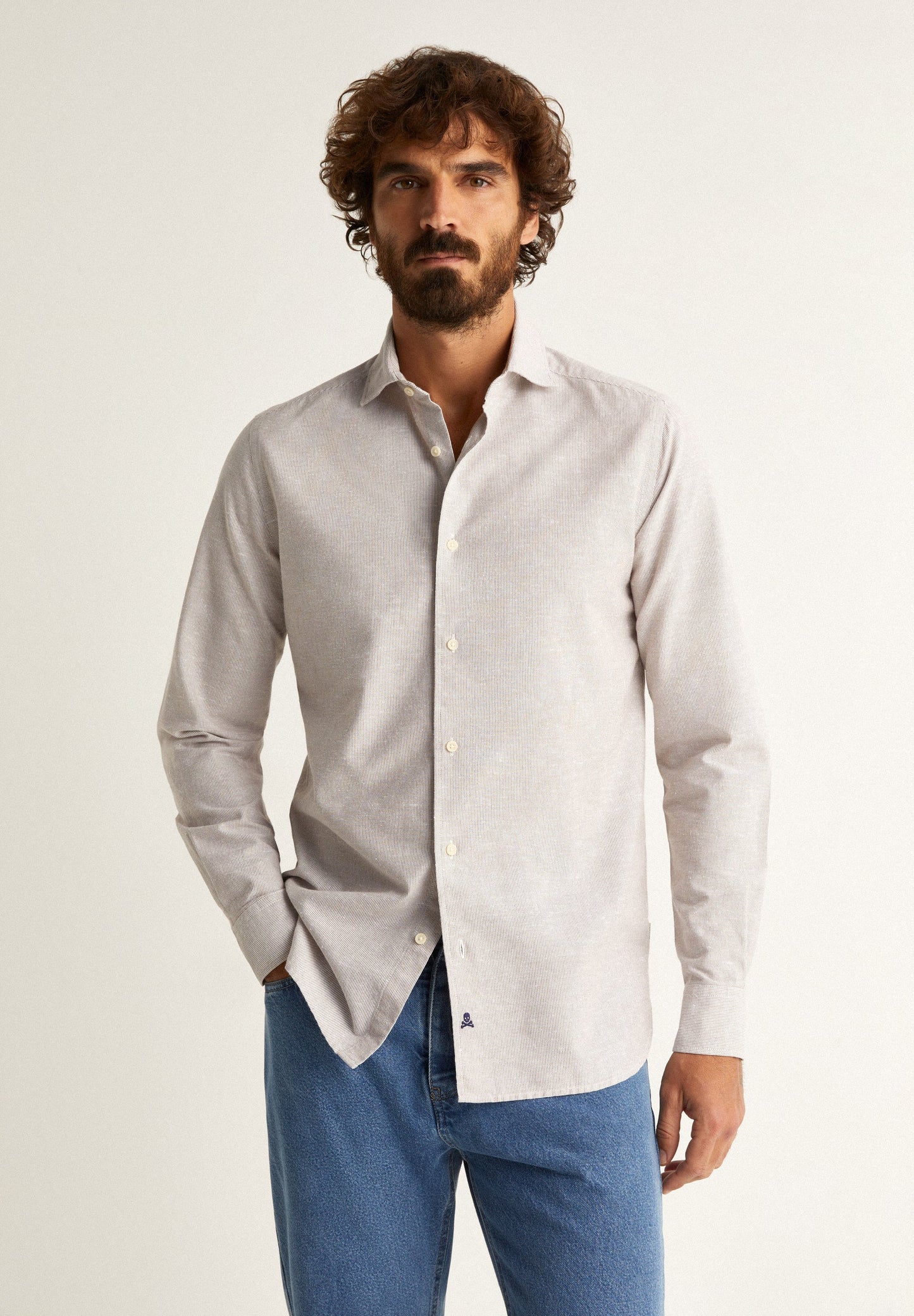 STRIPED SHIRT WITH SKULL AND FLAP