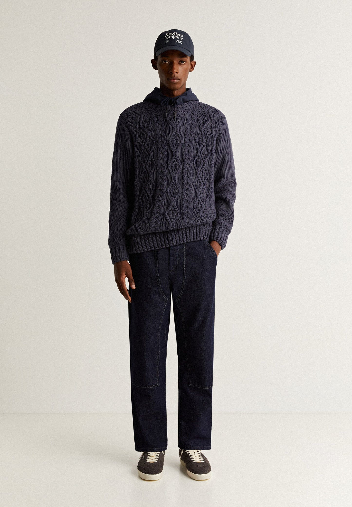 SWEATER WITH CABLE-KNIT DETAILS