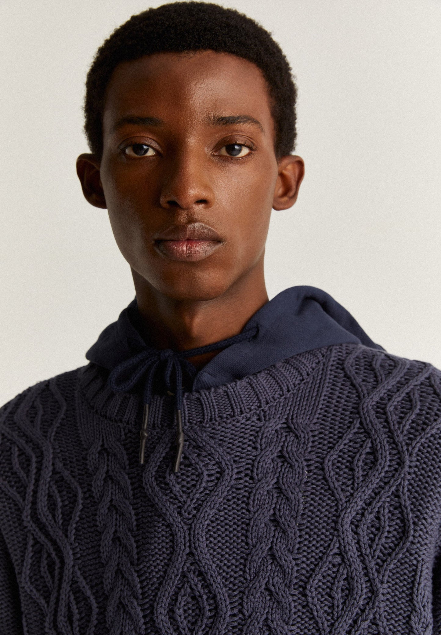 SWEATER WITH CABLE-KNIT DETAILS