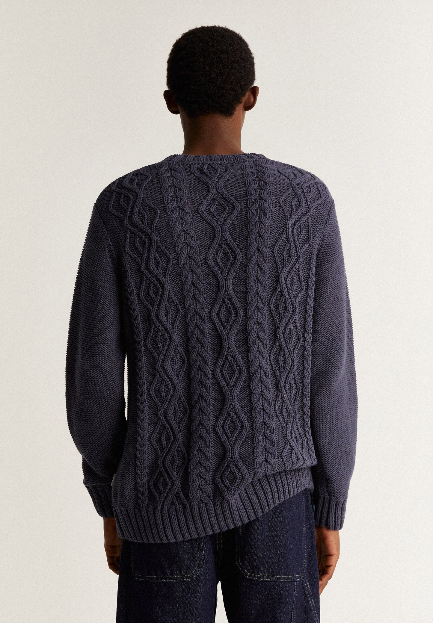 SWEATER WITH CABLE-KNIT DETAILS